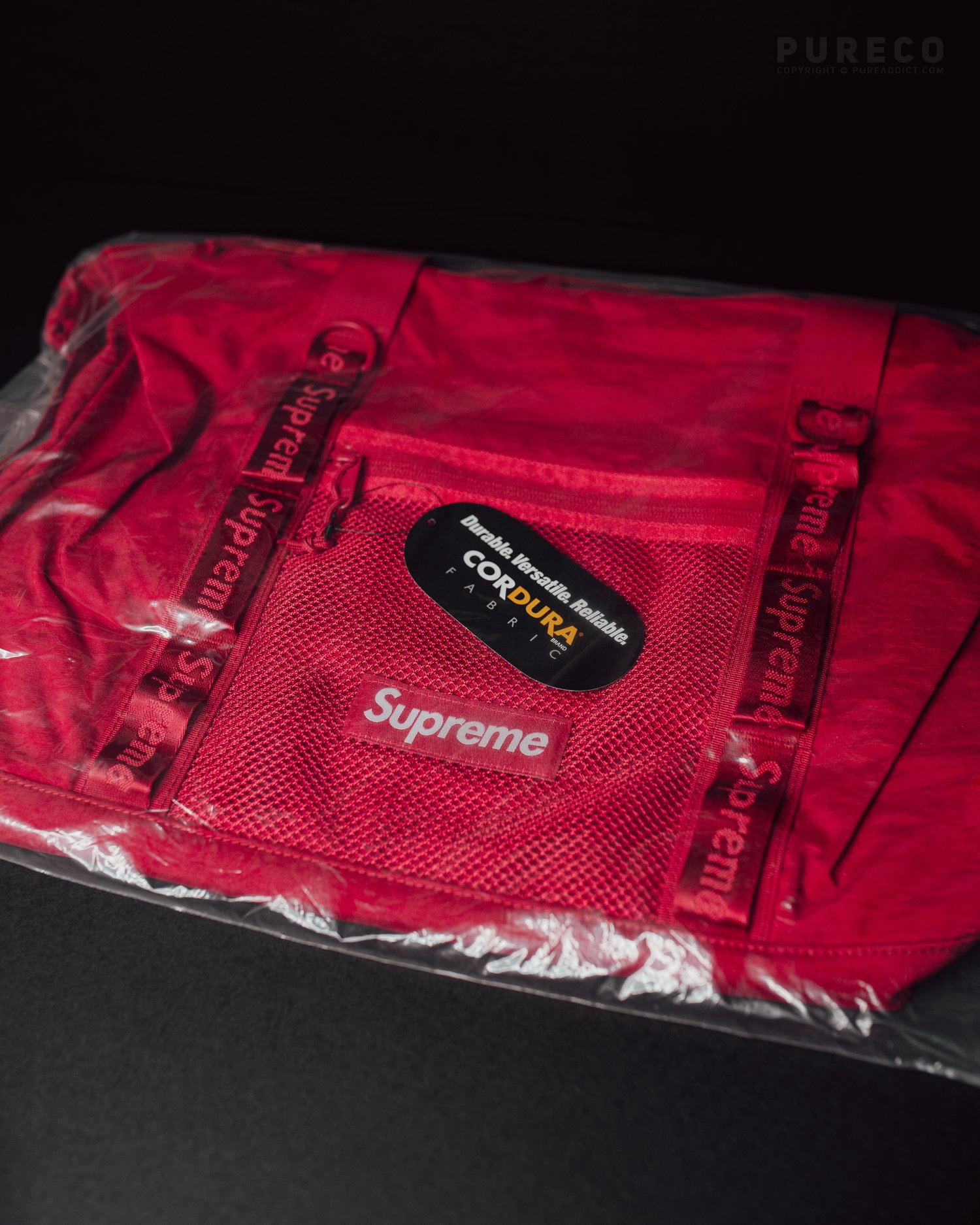 red supreme crossbody bag