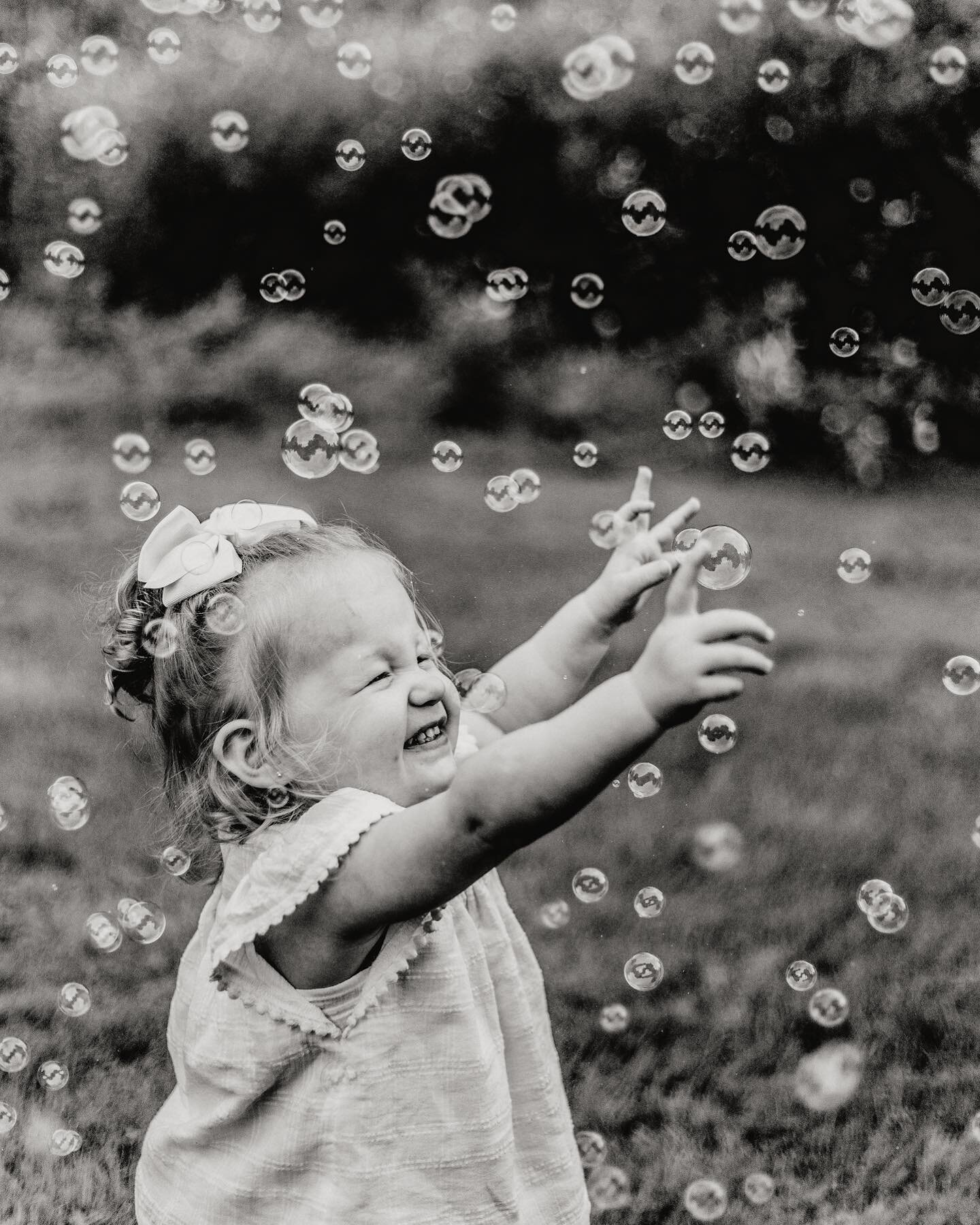 Is there anyone more joyful than a little kid who is chasing bubbles?