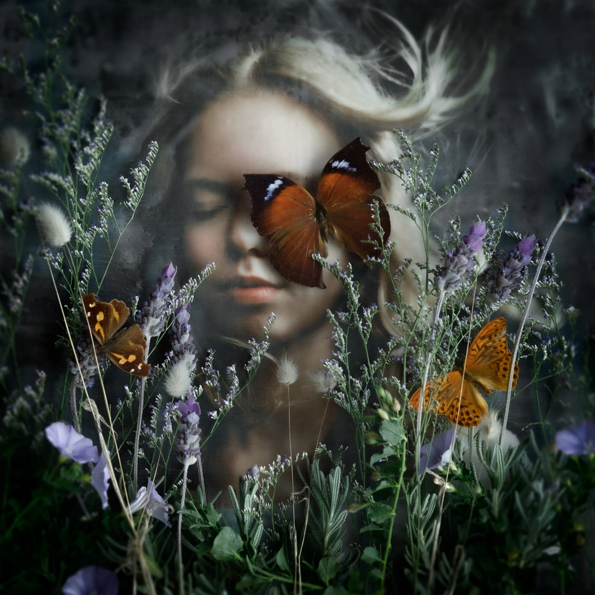 A woman with blonde hair among purple and white flowers, with a few butterflies resting on the flowers and near her face.