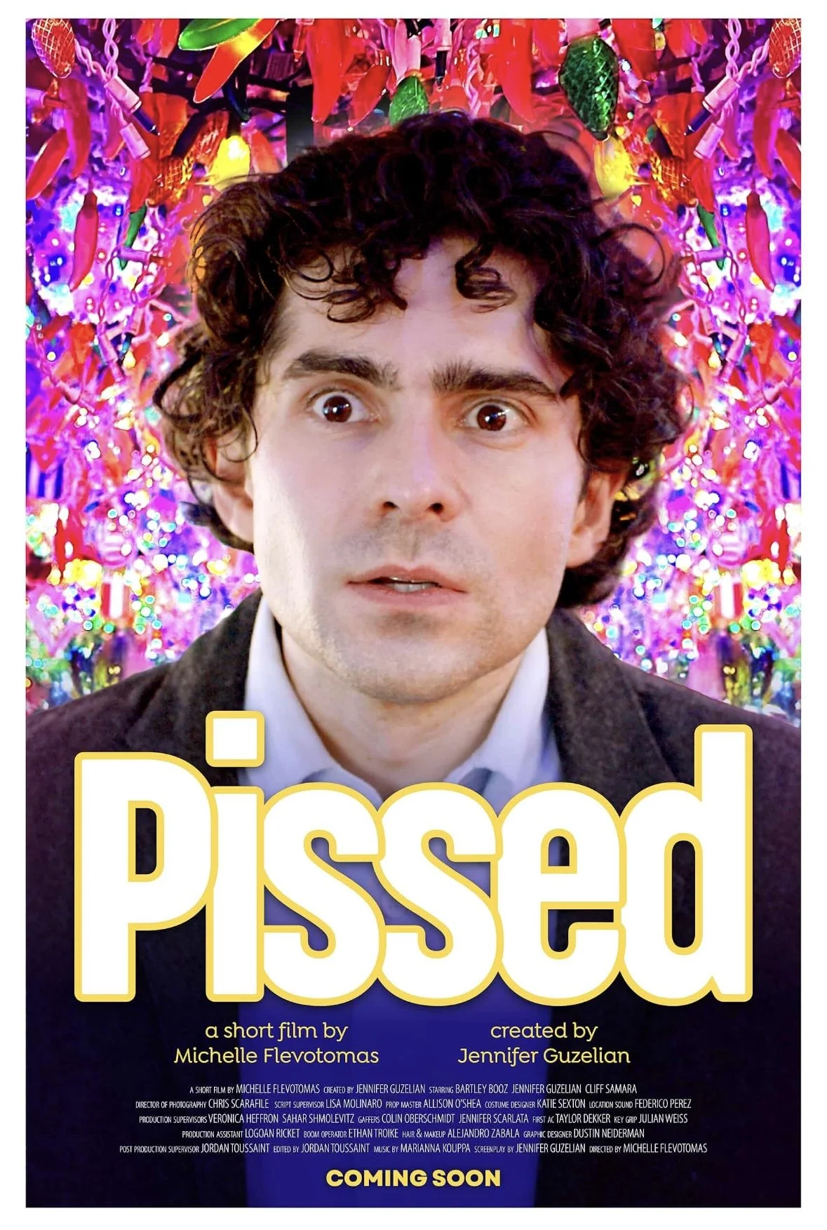 Close-up of a man with curly dark hair and wide eyes, with colorful, festive lights and decorations in the background. The title 'Passed' is displayed prominently at the bottom.
