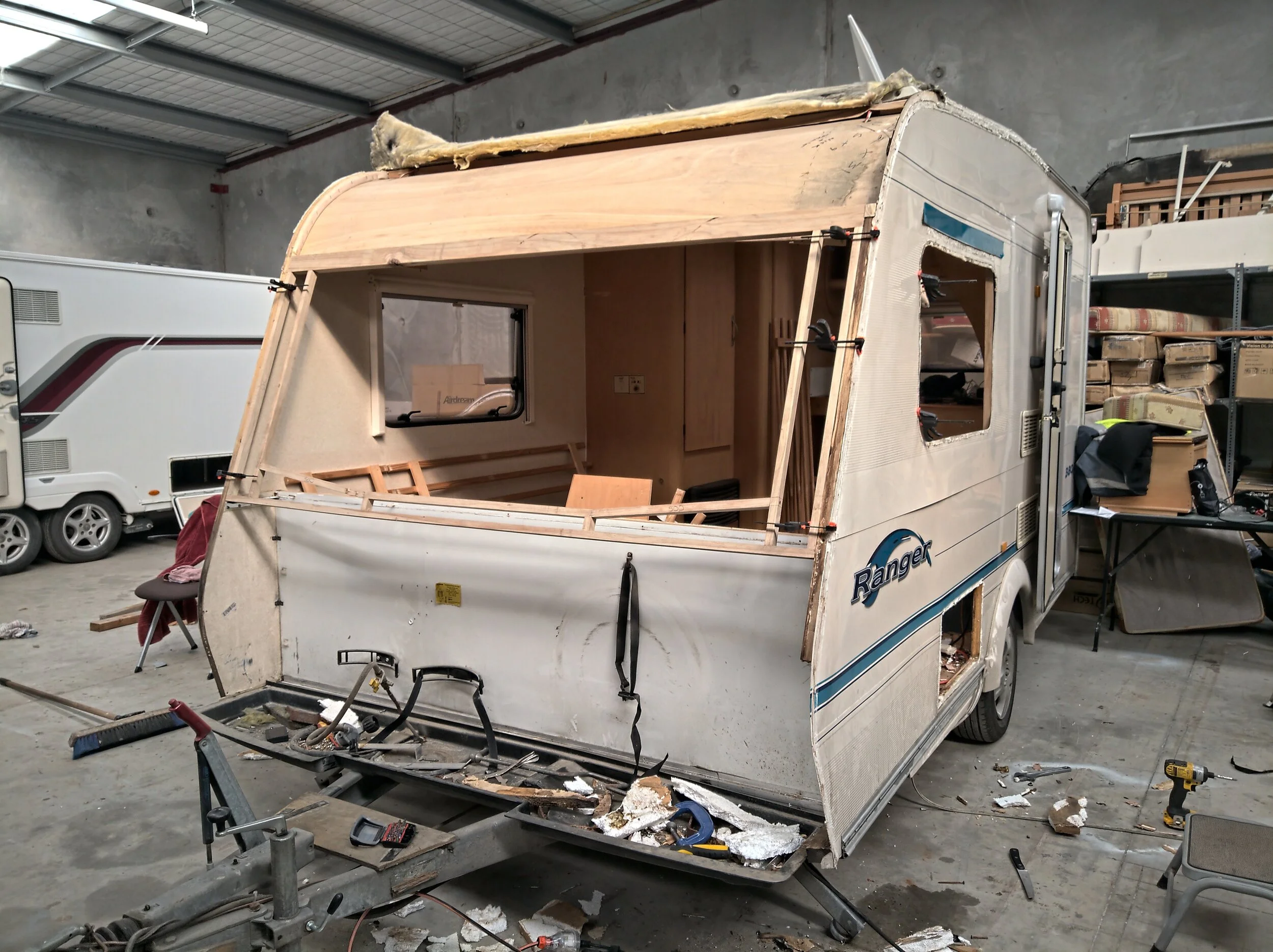 Test fitting the new front wall. A previous repair meant there was very little of the original left to take measurements off - all dimensions had to be taken from the front fascia.