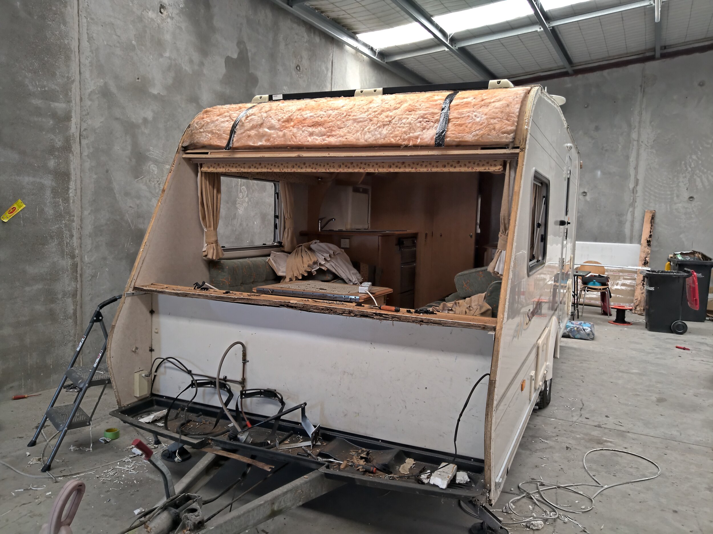 Front wall removed. Look at the front edge of the bulkhead, it's damaged beyond repair.