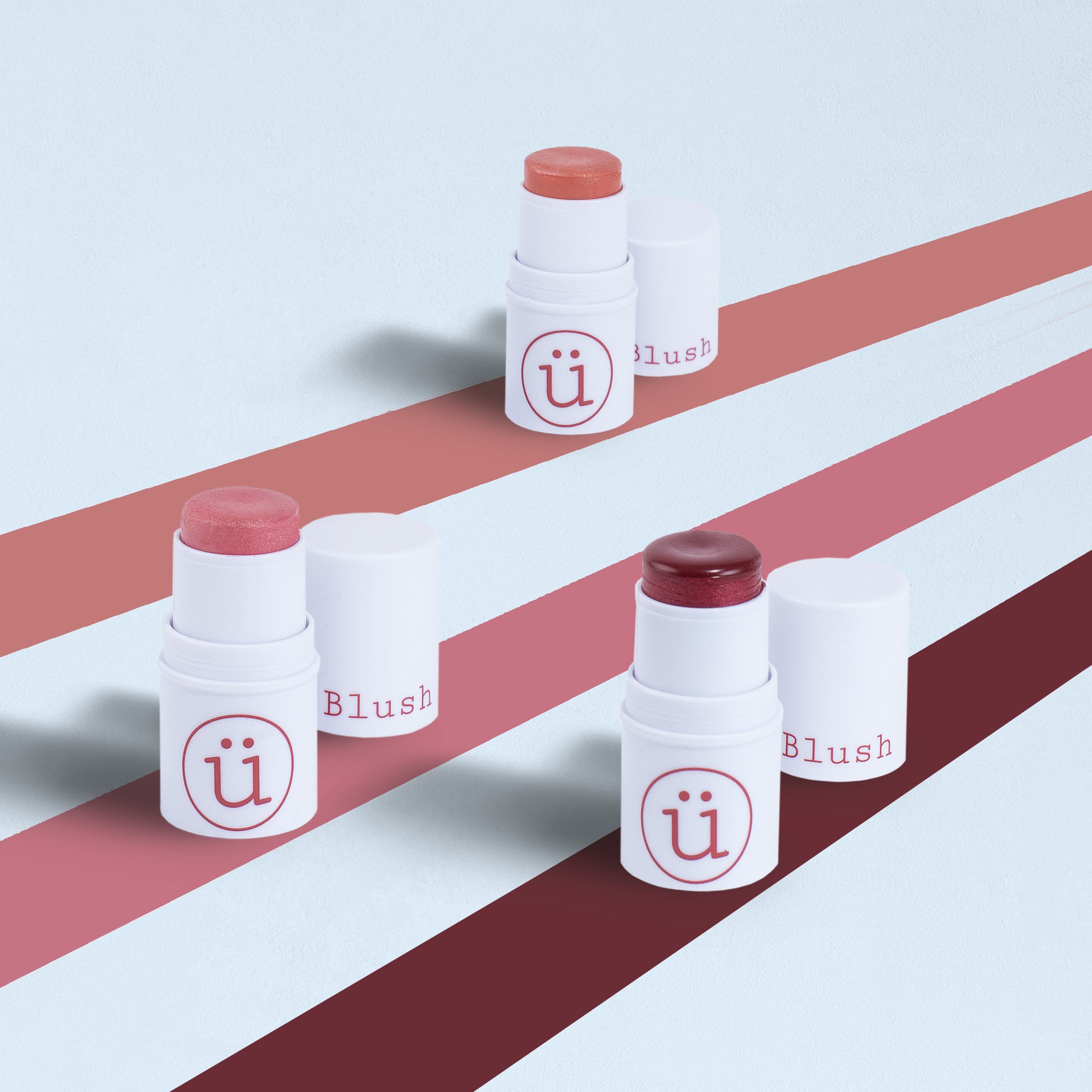 M2U Blush stick-trio on blue.jpg