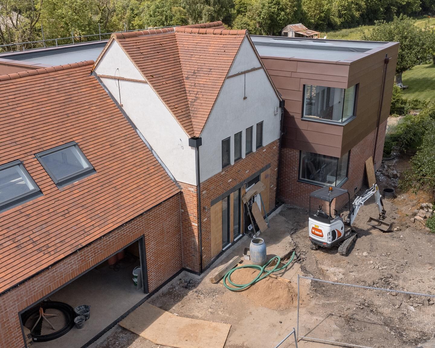 Exciting progress is being made on this bespoke new home in the Derbyshire countryside for our brilliant clients. Scaffolding has been dropped to reveal the beautiful zinc cladding, glass-to-glass corner windows and garden facing sliding doors. More 