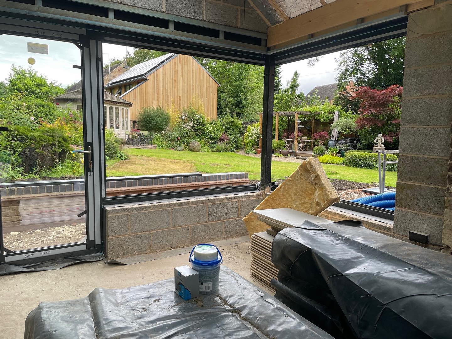 This modest extension to a Grade II listed, former mill managers house, replaces a not-particularly sensitive conservatory added by the previous owners. The replacement structure offers improved thermal efficiency whilst retaining a good connection w