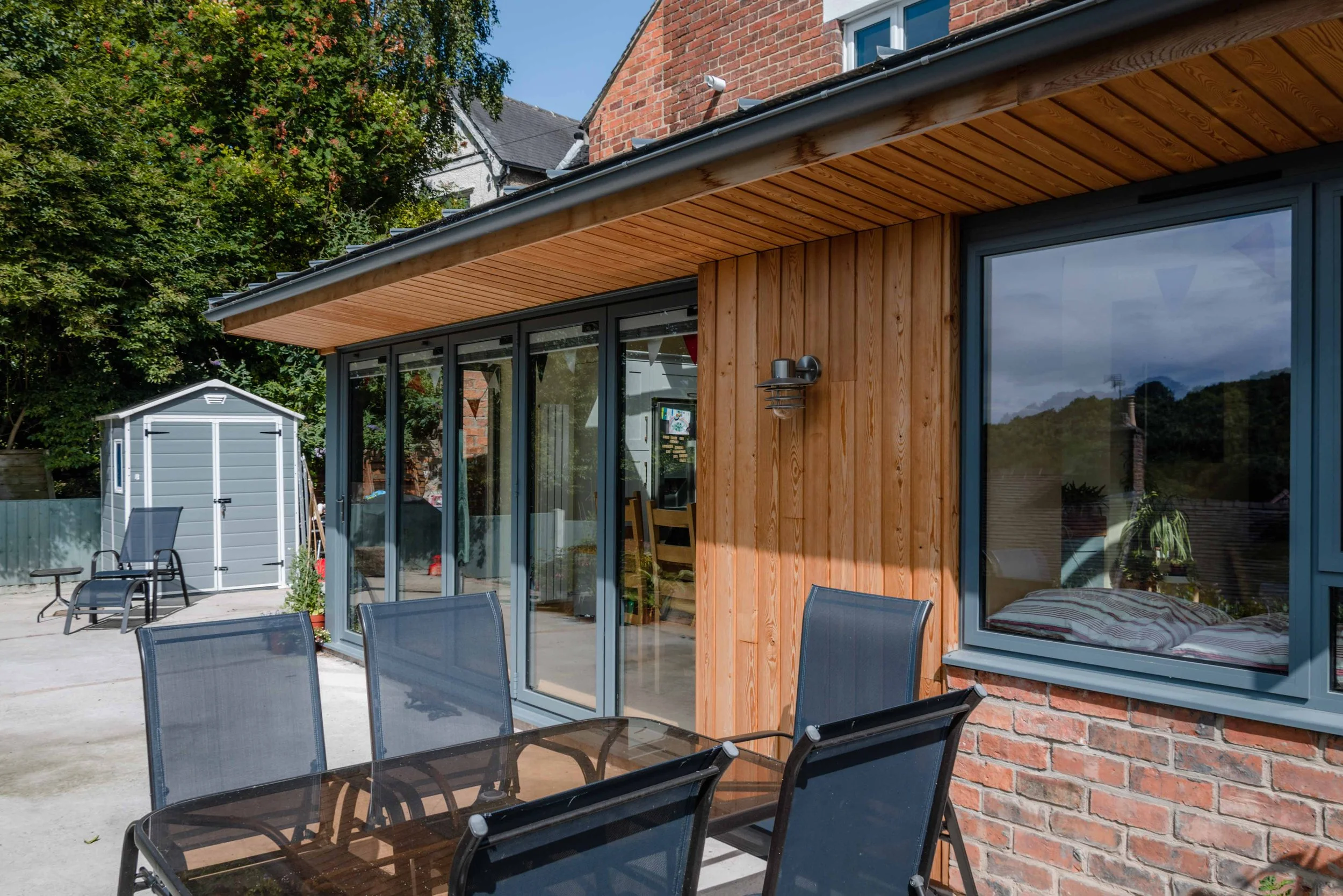 Rear extension in Conservation Area with timber cladding and zinc roof ...