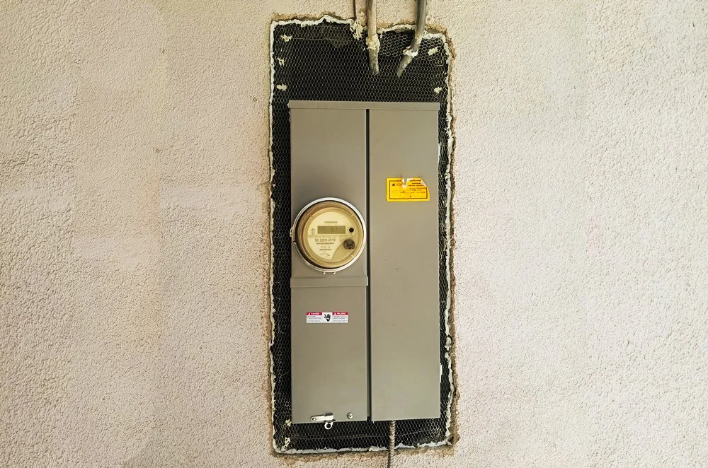 Flush-mounted 200 amp residential electrical service panel upgrade completed by our team.