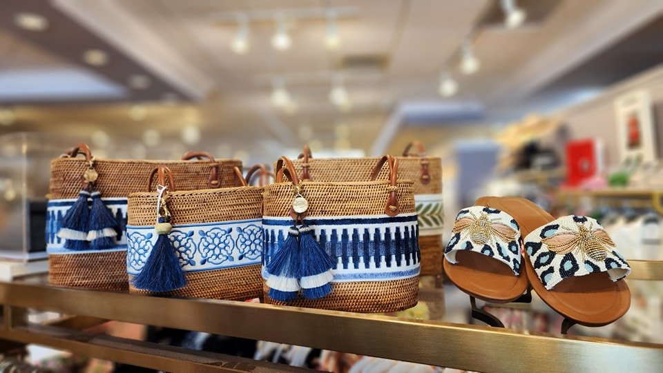 🌞 Summer Essentials Alert at Nest in the Village! 🌊

Dive into summer style with our chic selection of rattan purses in various designs, perfect for any sunny day outing. Pair your new favorite bag with our beautiful beaded open-toe sandals for a l