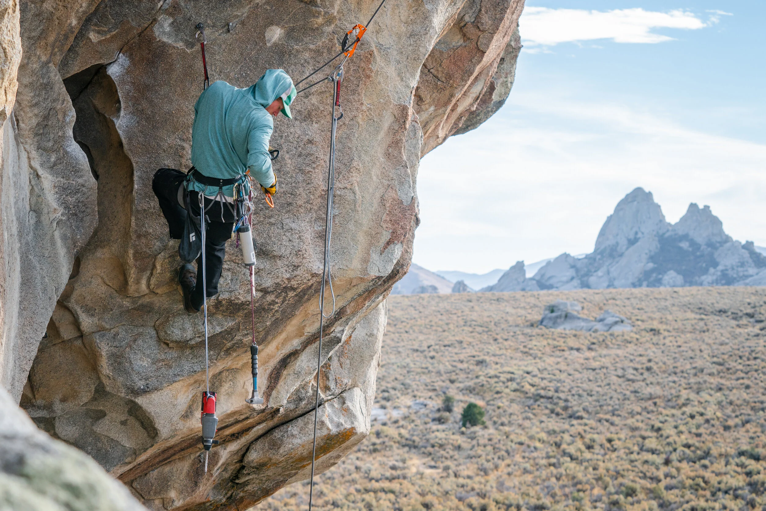 Rebolting climbing routes is a task done often by unseen volunteers, like Nate Liles.
