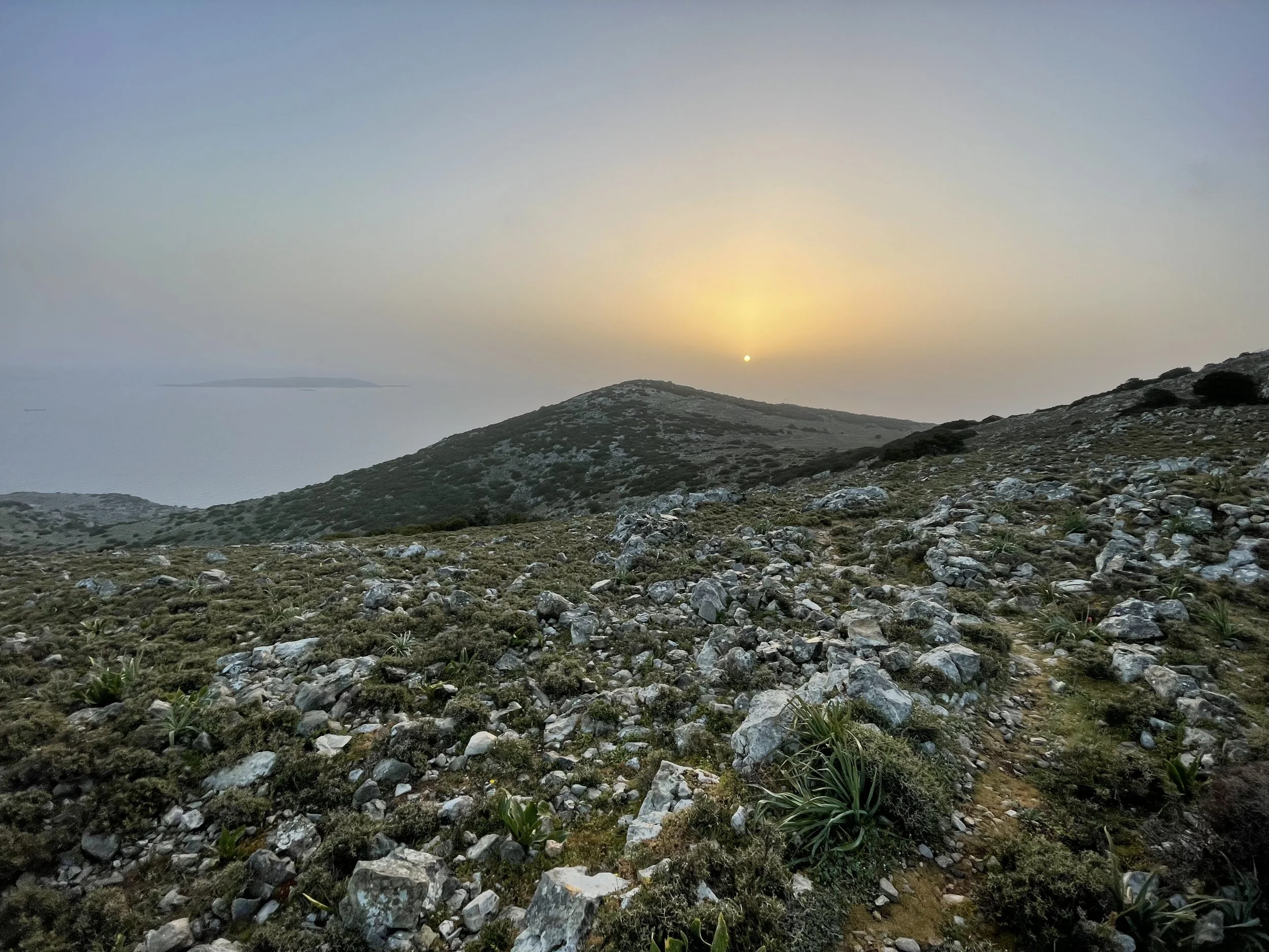 A cloudy dawn breaking over the Aegean.