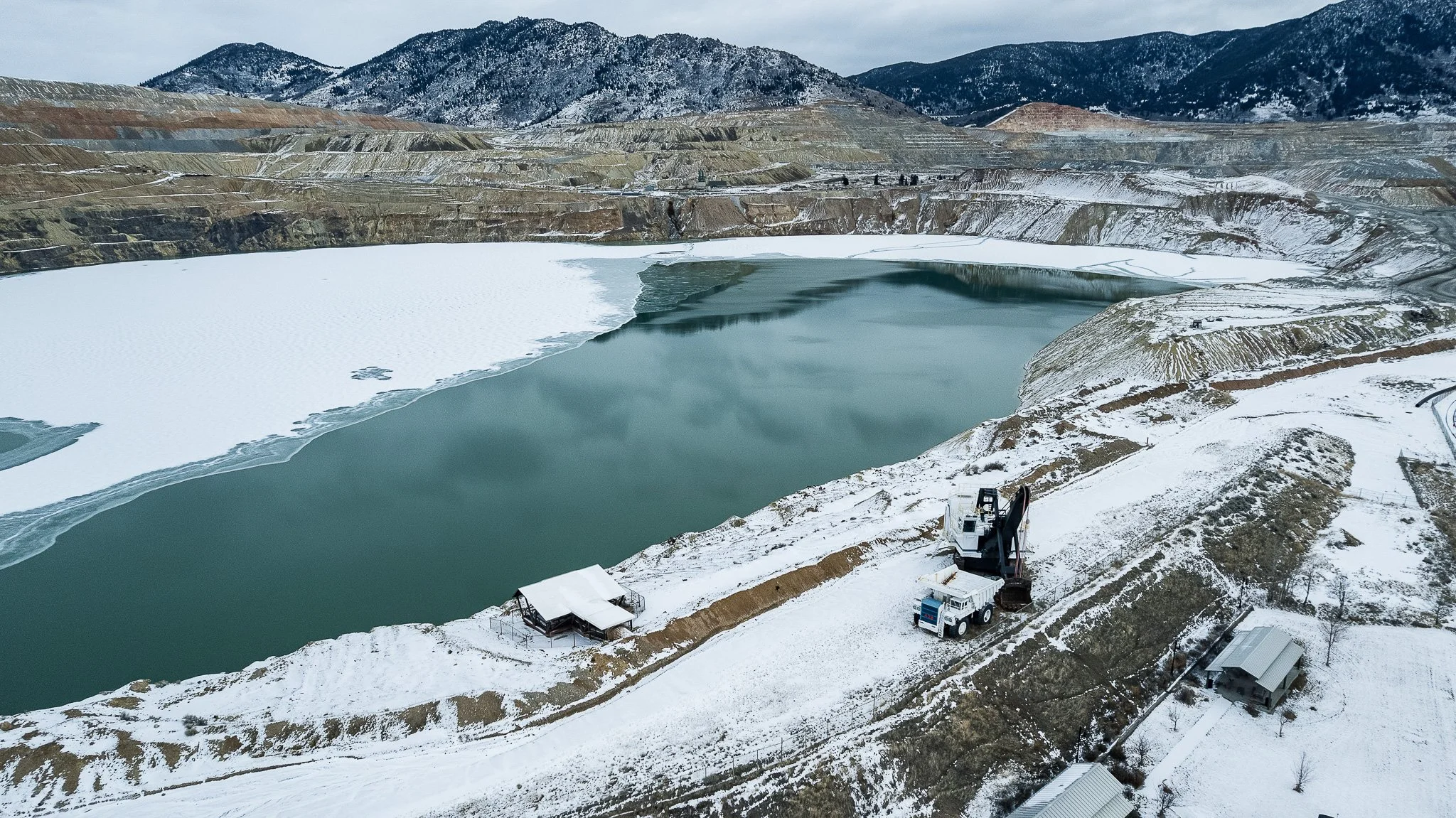 The bluer-than-blue Berkeley Pit in Butte, MT, contaminated with toxic levels of heavy metals from a century of mining.