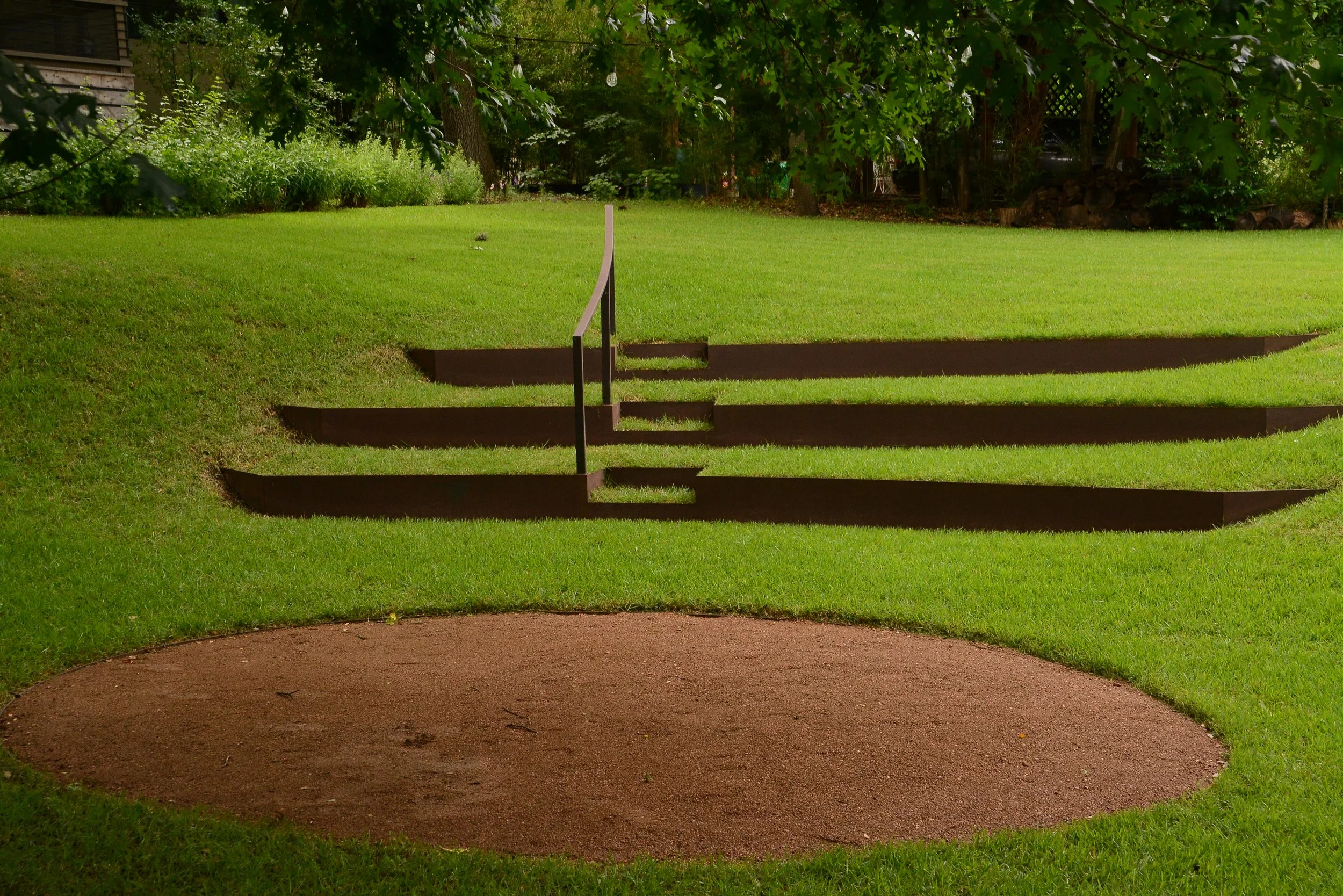 lawn amph step dark closer.JPG