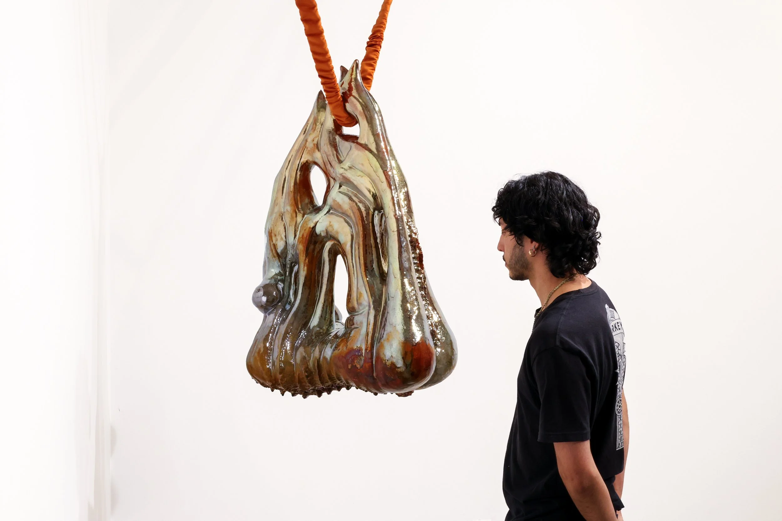 Title: Vanishing; Size: H39" x W 26" X D 14"; Media: Ceramic, In-glaze lustre, suede; Year: 2025.
