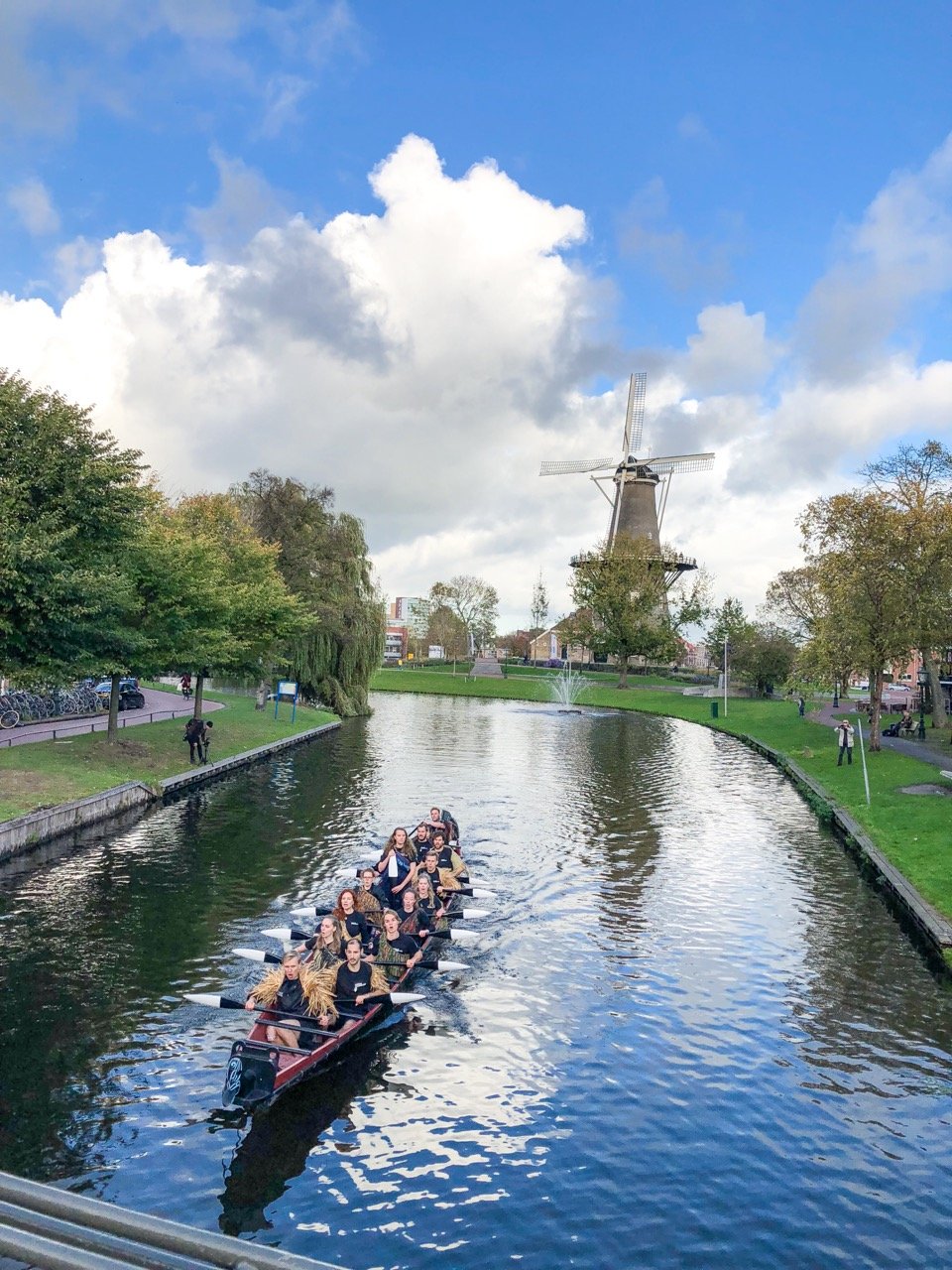  Production still from ‘Going Native’ (2017/2022) by Yuki Kihara.   Featuring  ‘ Te hono ki Aotearoa: The Link To New Zealand’ student rowing club members paddling the Māori waka in Leiden, The Netherlands. Photo by Wonu Veys. Commissioned by the Nat