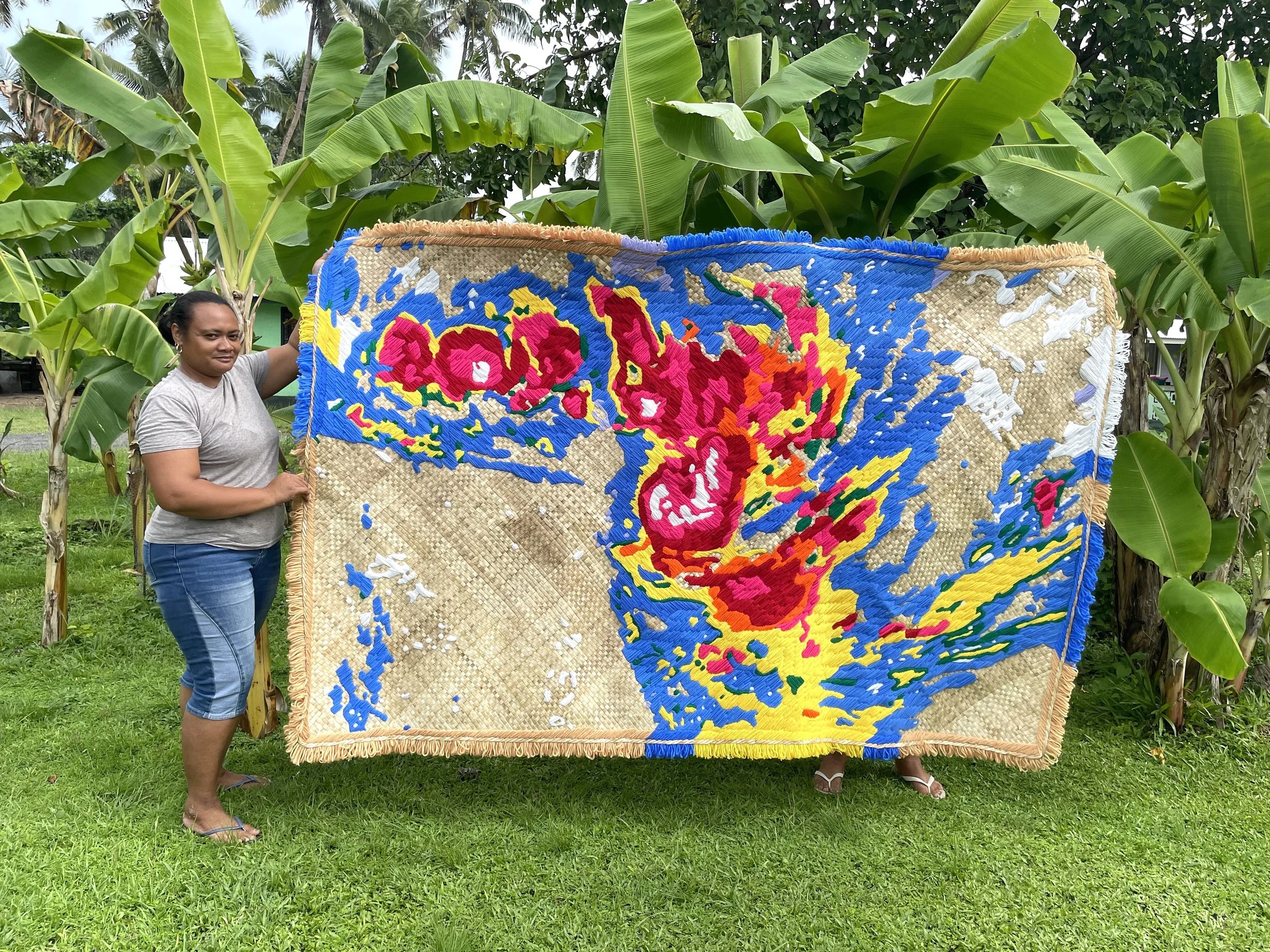  ‘Wilma’ (2026) by Yuki Kihara. Woollen embroidery on pandanus mat. Approx. 2.4 mt x 1.5 mt. Photo by Yuki Kihara. Courtesy of Yuki Kihara. 