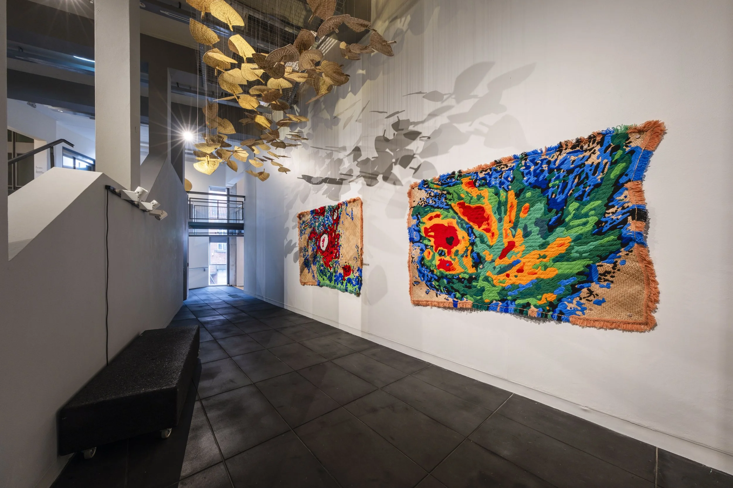  'Winds of Change' (2026) site-specific installation by Yuki Kihara. Ili supplied by The Sāmoa Victim Support Group (SVSG). Installation photo by Ted Whitaker. Courtesy of Te Pātaka Toi Adam Art Gallery, Aotearoa New Zealand. 