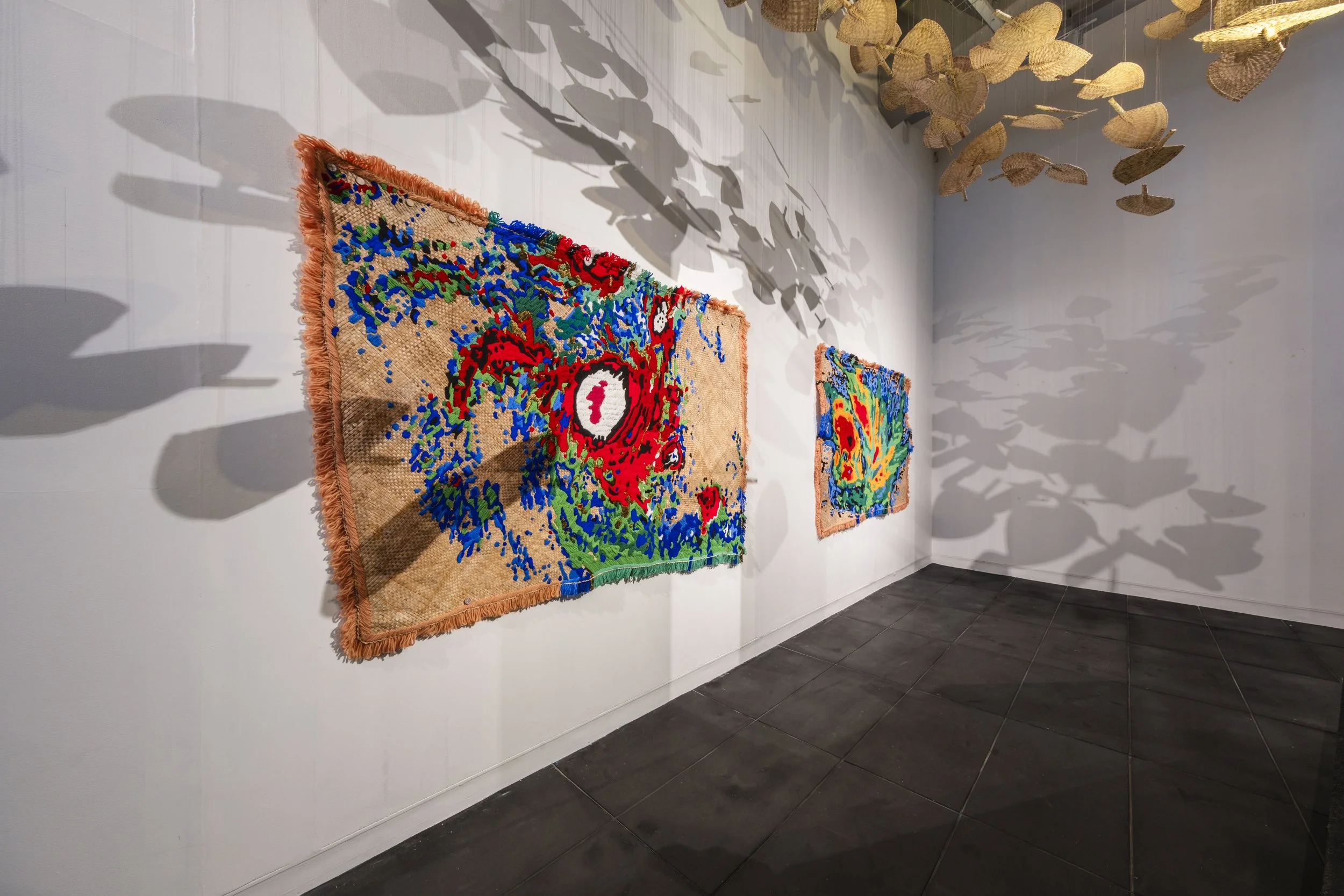  'Winds of Change' (2026) site-specific installation by Yuki Kihara. Ili supplied by The Sāmoa Victim Support Group (SVSG). Installation photo by Ted Whitaker. Courtesy of Te Pātaka Toi Adam Art Gallery, Aotearoa New Zealand. 