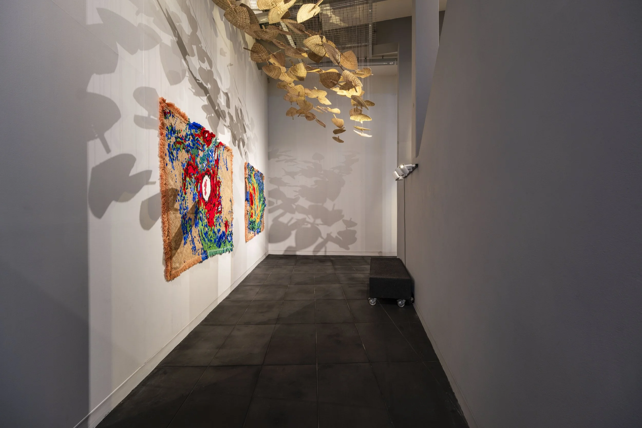  'Winds of Change' (2026) site-specific installation by Yuki Kihara. Ili supplied by The Sāmoa Victim Support Group (SVSG). Installation photo by Ted Whitaker. Courtesy of Te Pātaka Toi Adam Art Gallery, Aotearoa New Zealand. 