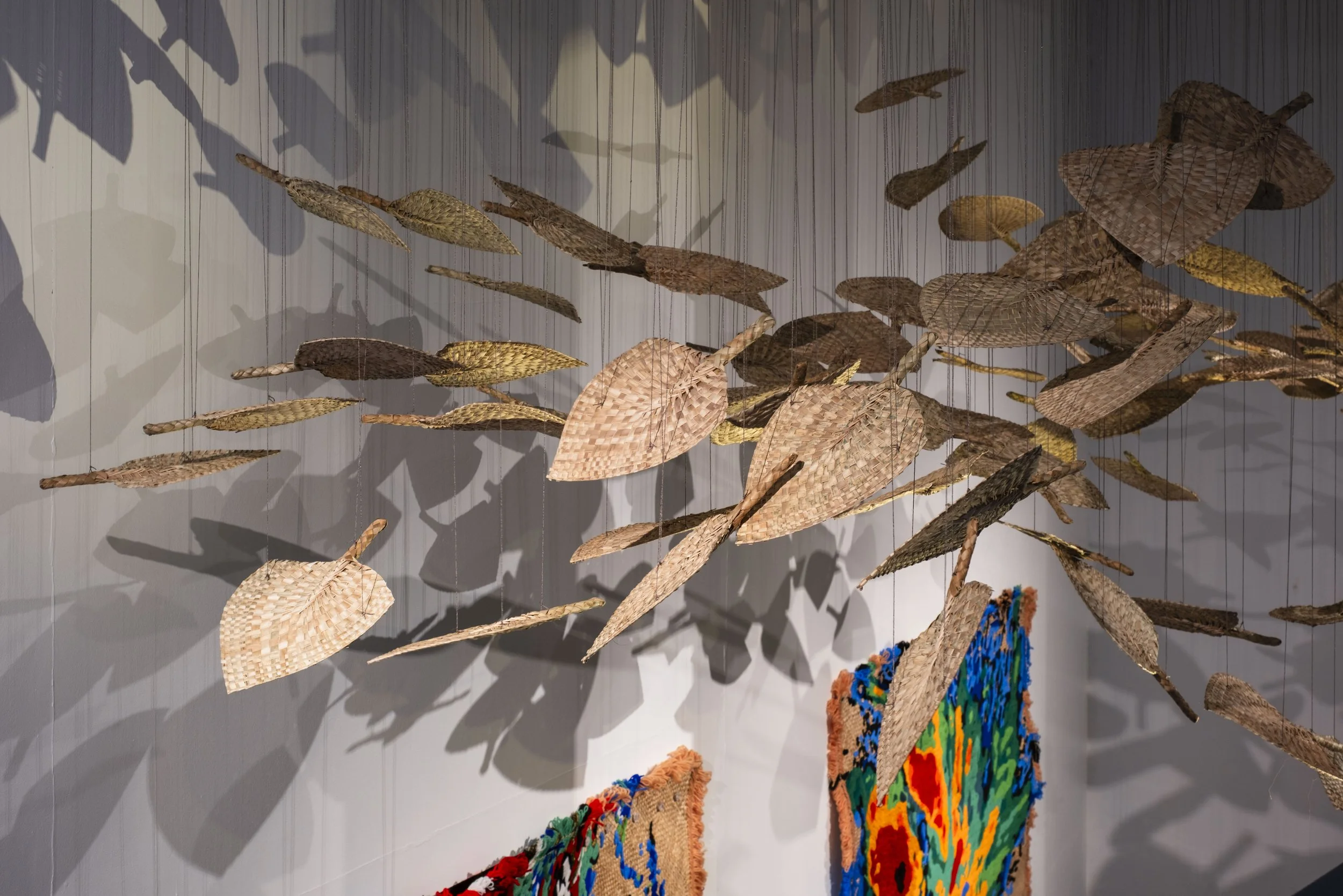  'Winds of Change' (2026) site-specific installation by Yuki Kihara. Ili supplied by The Sāmoa Victim Support Group (SVSG). Installation photo by Ted Whitaker. Courtesy of Te Pātaka Toi Adam Art Gallery, Aotearoa New Zealand. 
