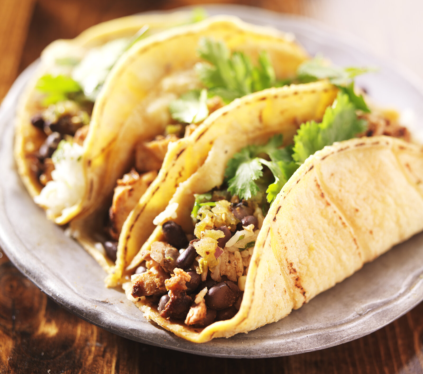 bigstock-Tacos--in-mexican-yellow-corn-54184112.jpg