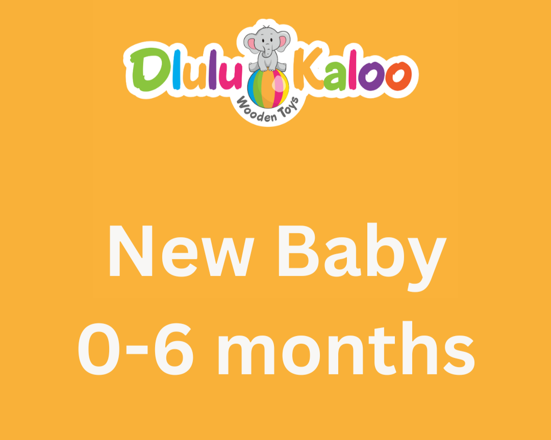 A promotional sign for Dulu Kaloo Wooden Toys with a logo featuring a cartoon elephant sitting on a colorful ball, highlighting a category of toys for babies aged 0-6 months.