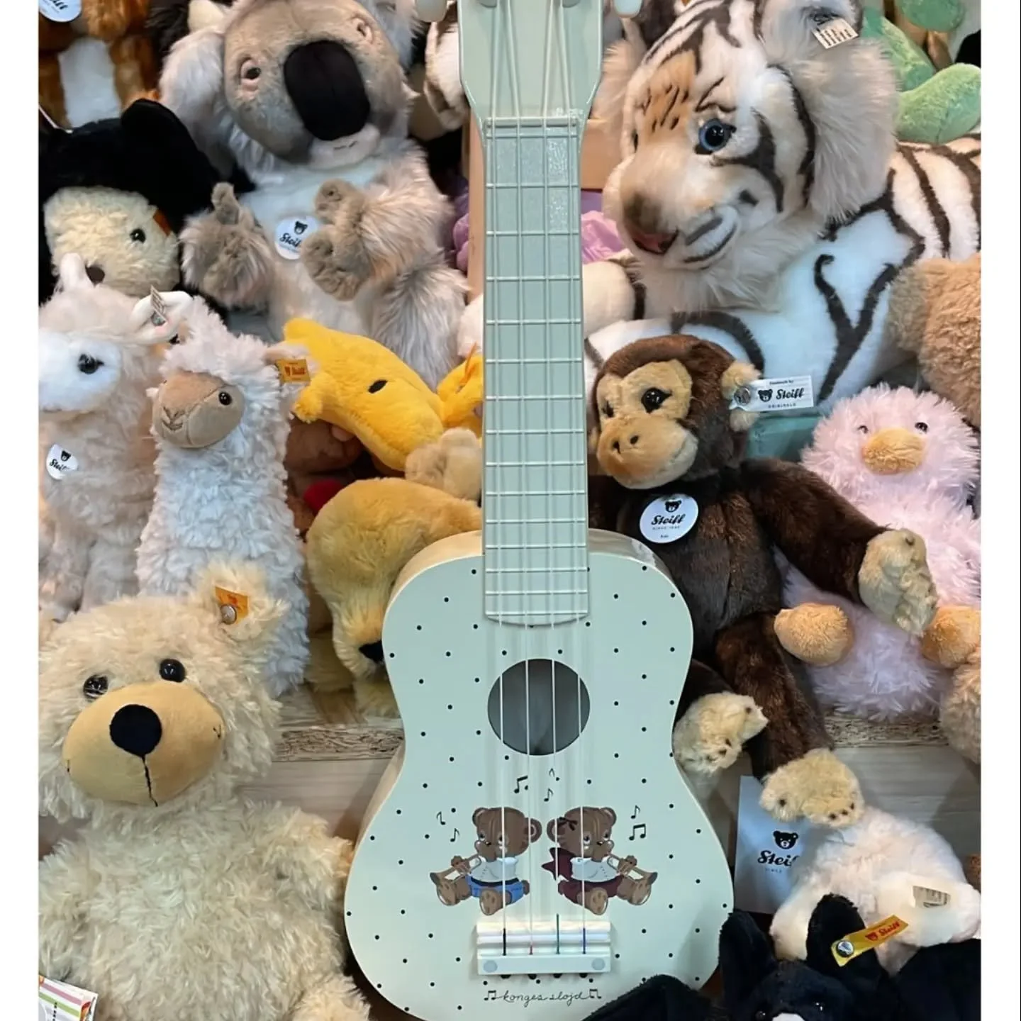 Is that... sleigh bells we hear? 🛷✨

​Christmas is creeping its way into the shop, and we know that finding those extra-special gifts (like this darling Konges Sl&oslash;jd ukulele surrounded by our favorite furry friends) takes a little planning.

