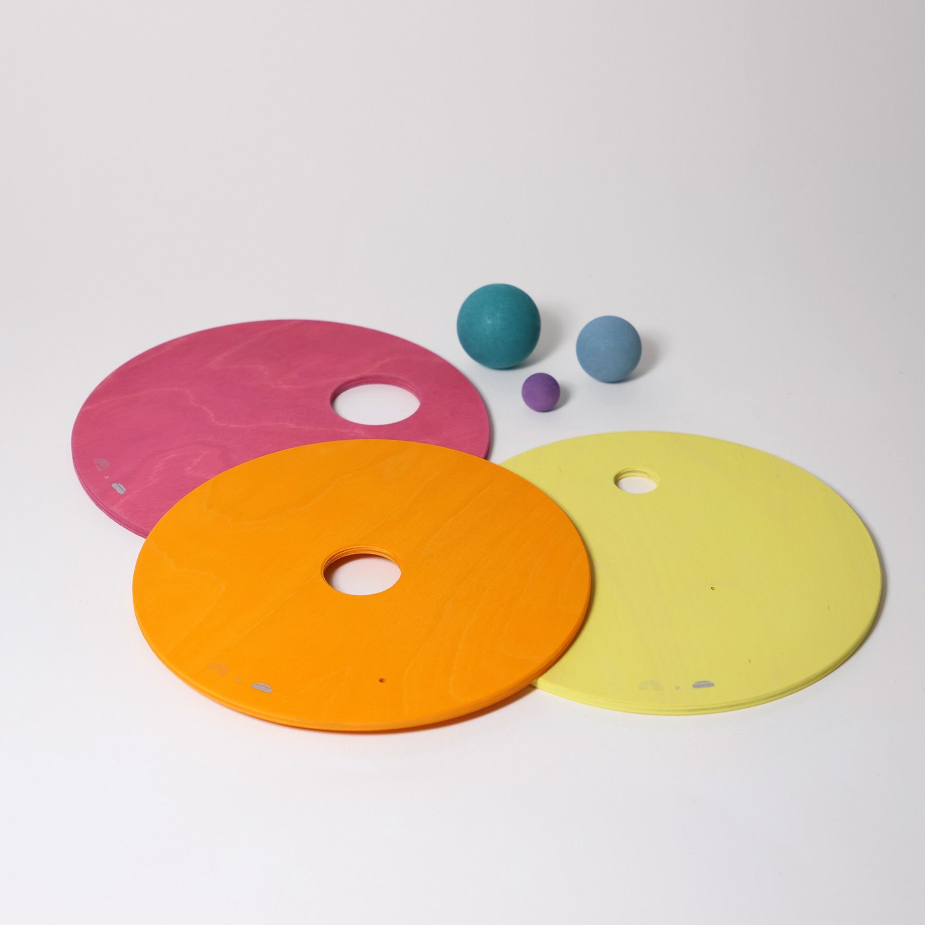 Grimms_Rolling_Discs_Warm_Pastel(1).jpg