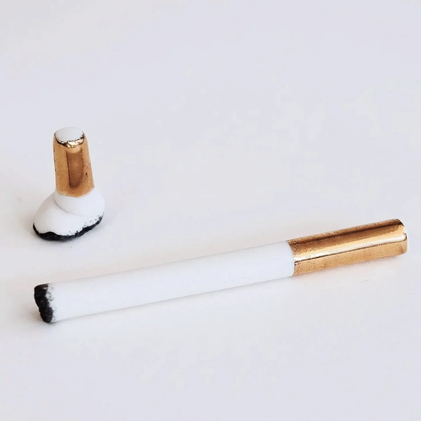 My submission for @pottersforpalestine will go live for auction on 11/24 at 10 am EST along with hundreds of other amazing potters.
&bull; FHAR Studio
&bull; Cigarette and cigarette butt
&bull; hand sculpted porcelain and 24K gold
&bull; about realis