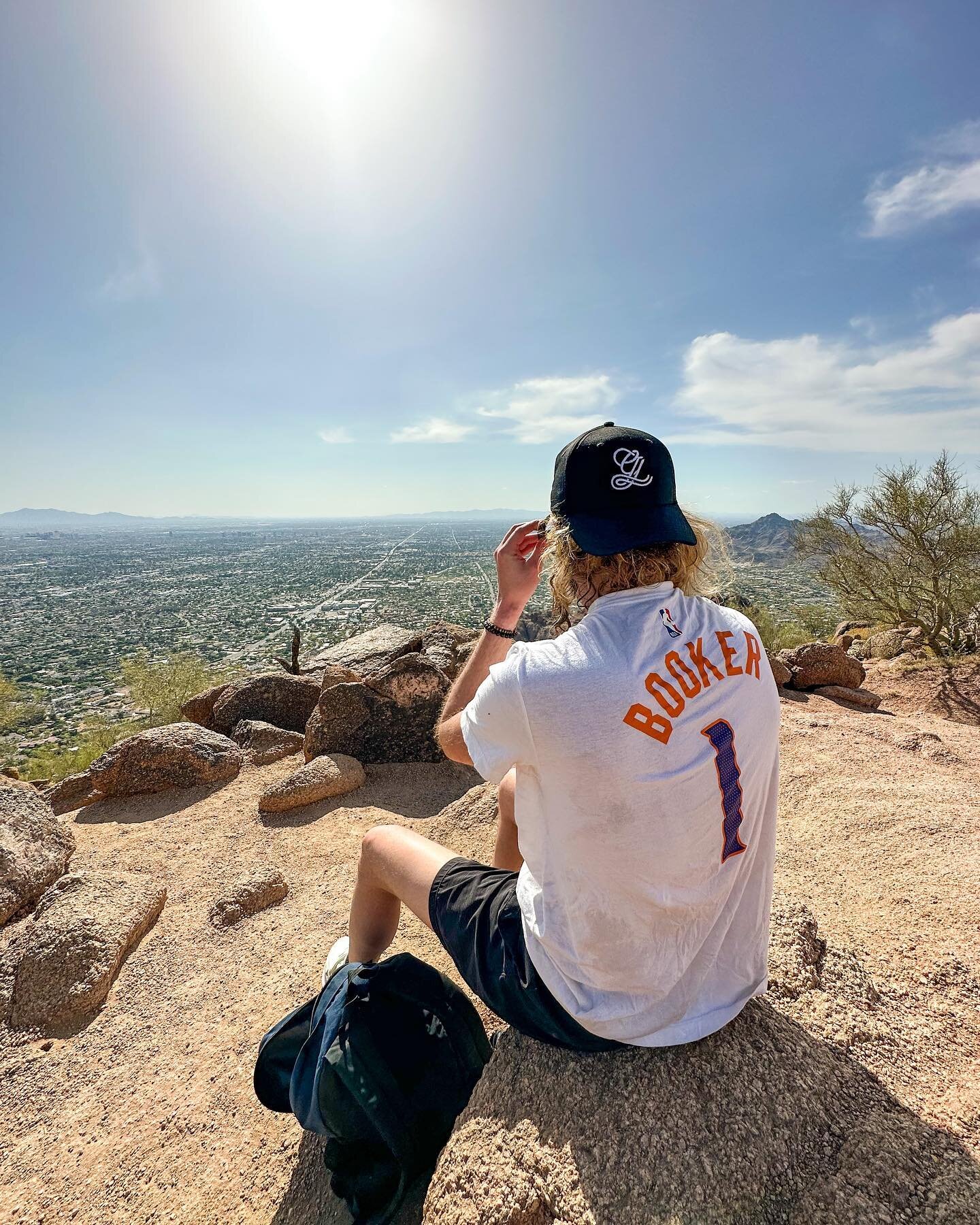 Cue David Attenborough voice: &ldquo;A wild GL hat sits atop a human atop a mountain, overlooking the wonders of the world.&rdquo; 🌎