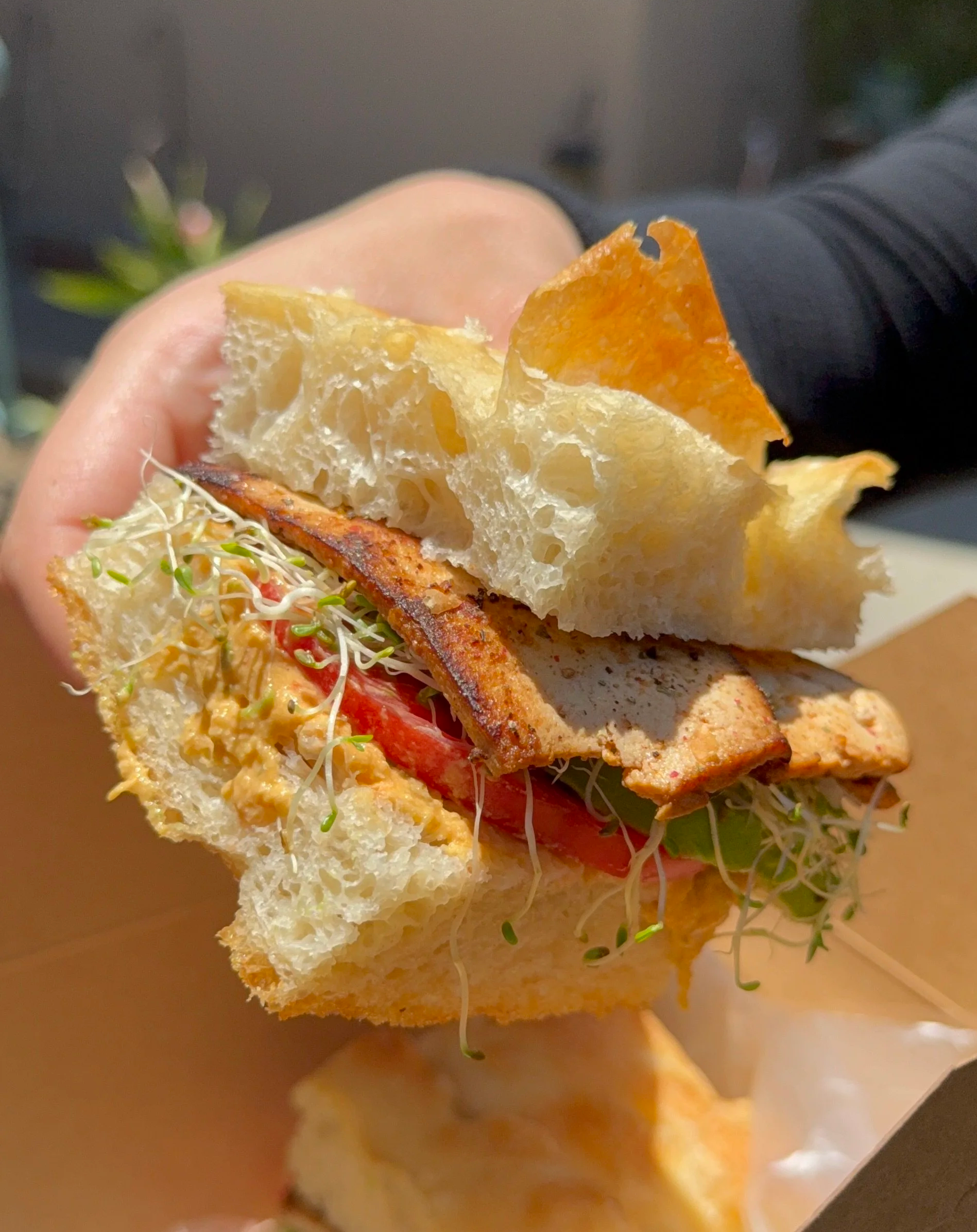 vegan spicy caesar focaccia sandwich