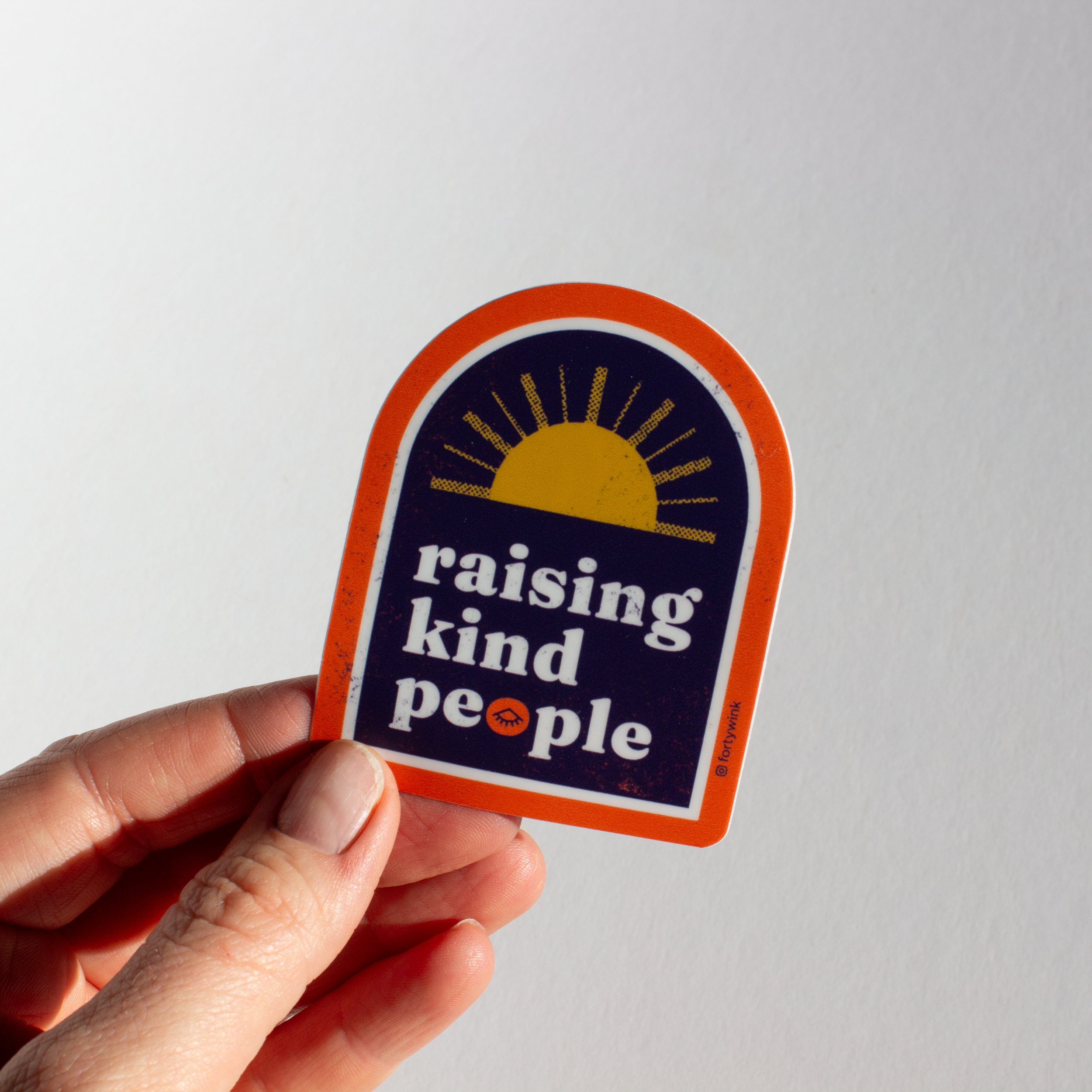 fw-print winter 2025-raising kind sticker hand.png