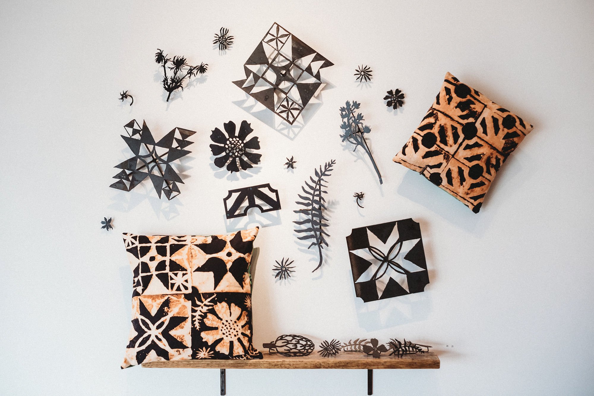 bleach stamped cotton pillows and metal stamps.
photo: Ephemera Designs