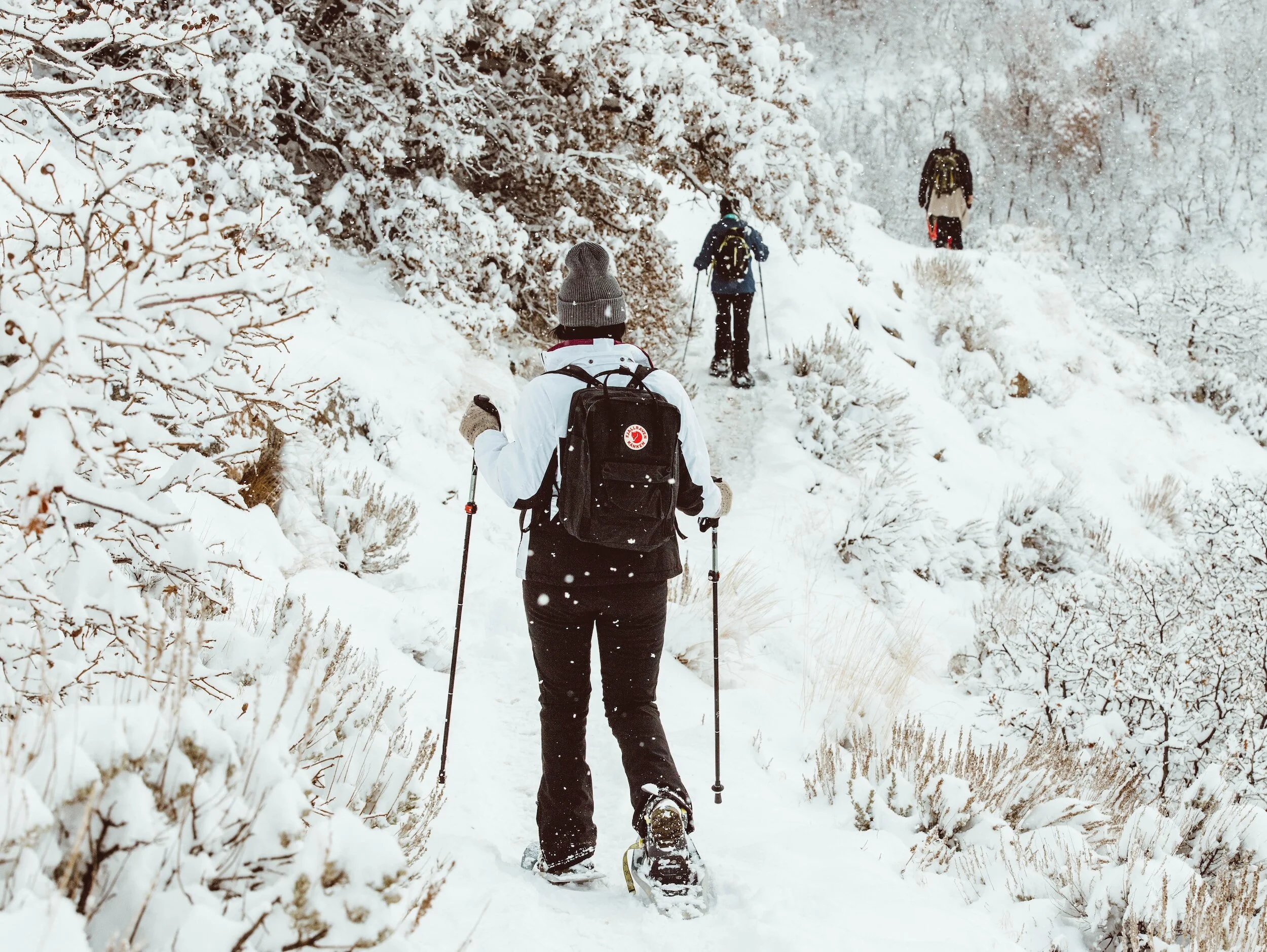 Girl snowshoeing in mountains