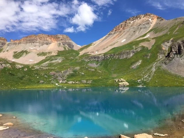 Ice Lake in the San Juan Mountains near Silverton Colorado showing alpine snowpack and mountain water systems