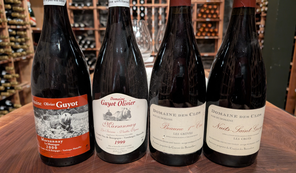 4 bottles of wine inside wine cellar