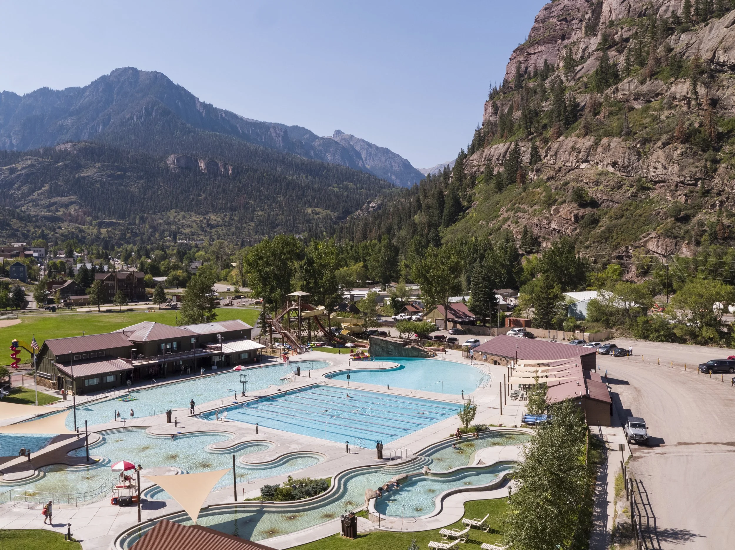Ouray Hot springs pool with mountains rising above