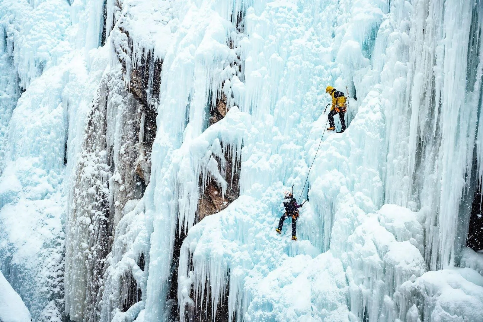 Two People on ice wall climbing