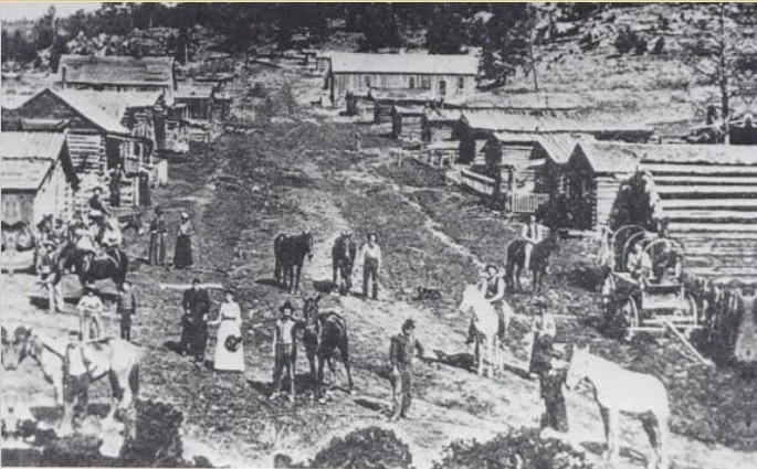 Manhattan gold mining town in Colorado’s San Luis Valley, circa 1888, showing a high-elevation frontier settlement similar in lifestyle and challenges to San Juan Mountains mining camps.