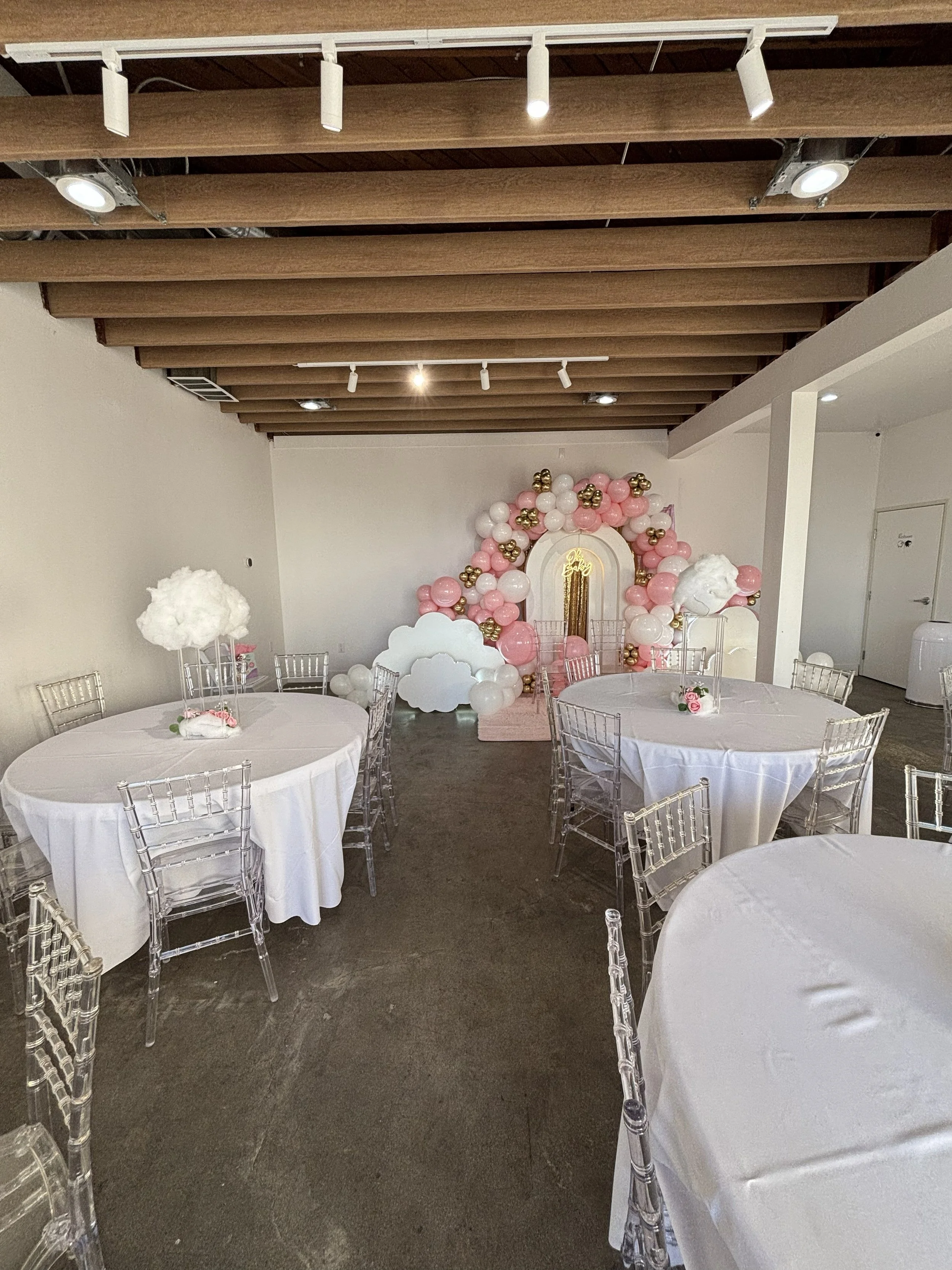 The Cotton Candy Factory event venue in Norwalk, CA — pink balloon arch setup