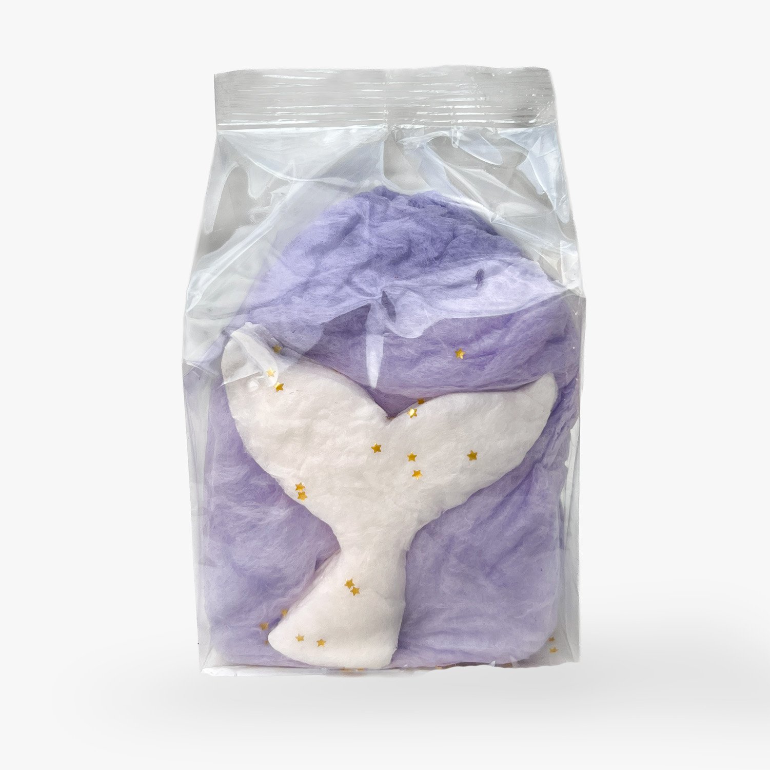 a blue cotton candy favor bag with an edible mermaid tail and edible glitter