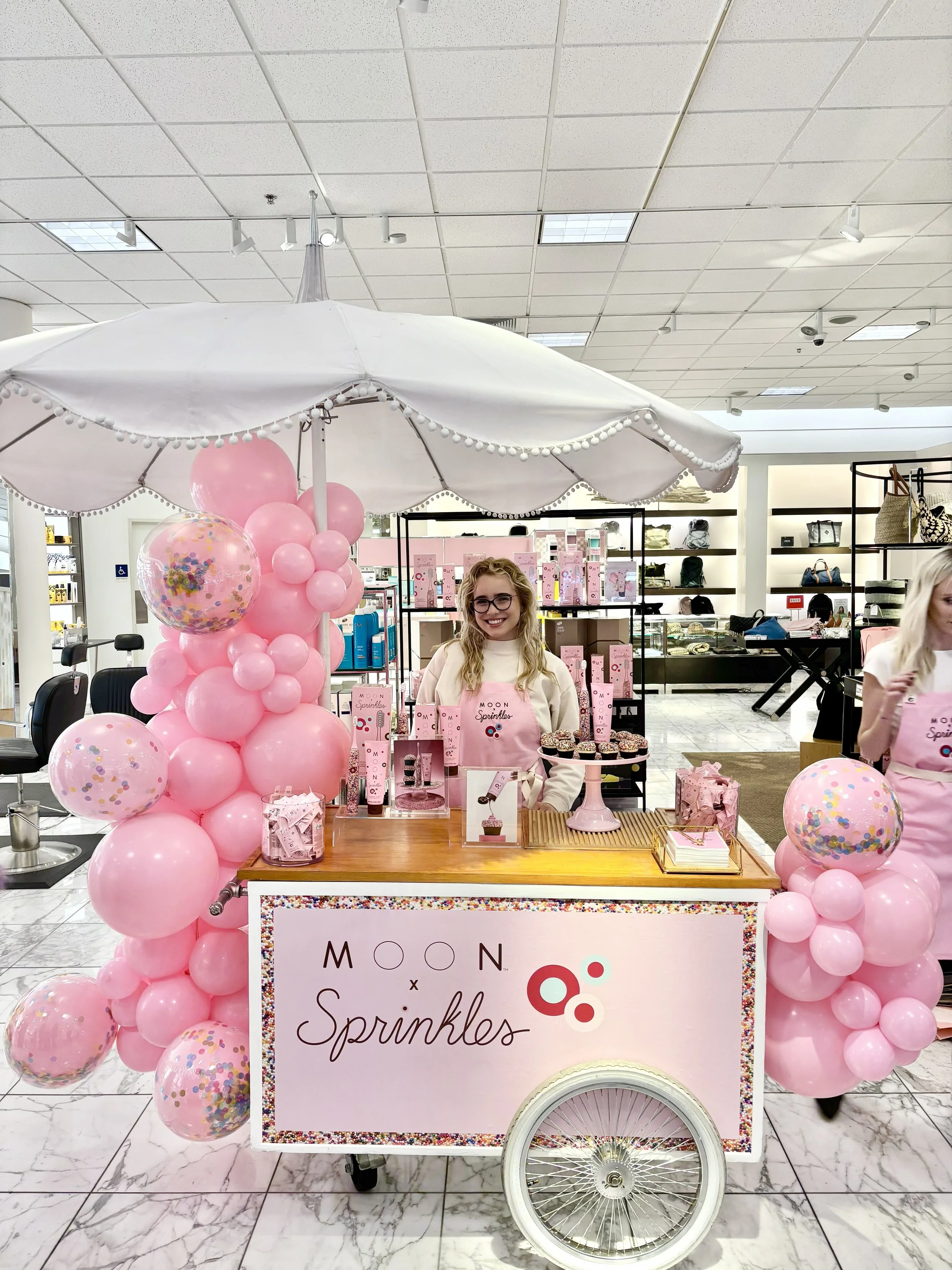 cupcake cart with full-front custom brand panel for a corporate brand activation