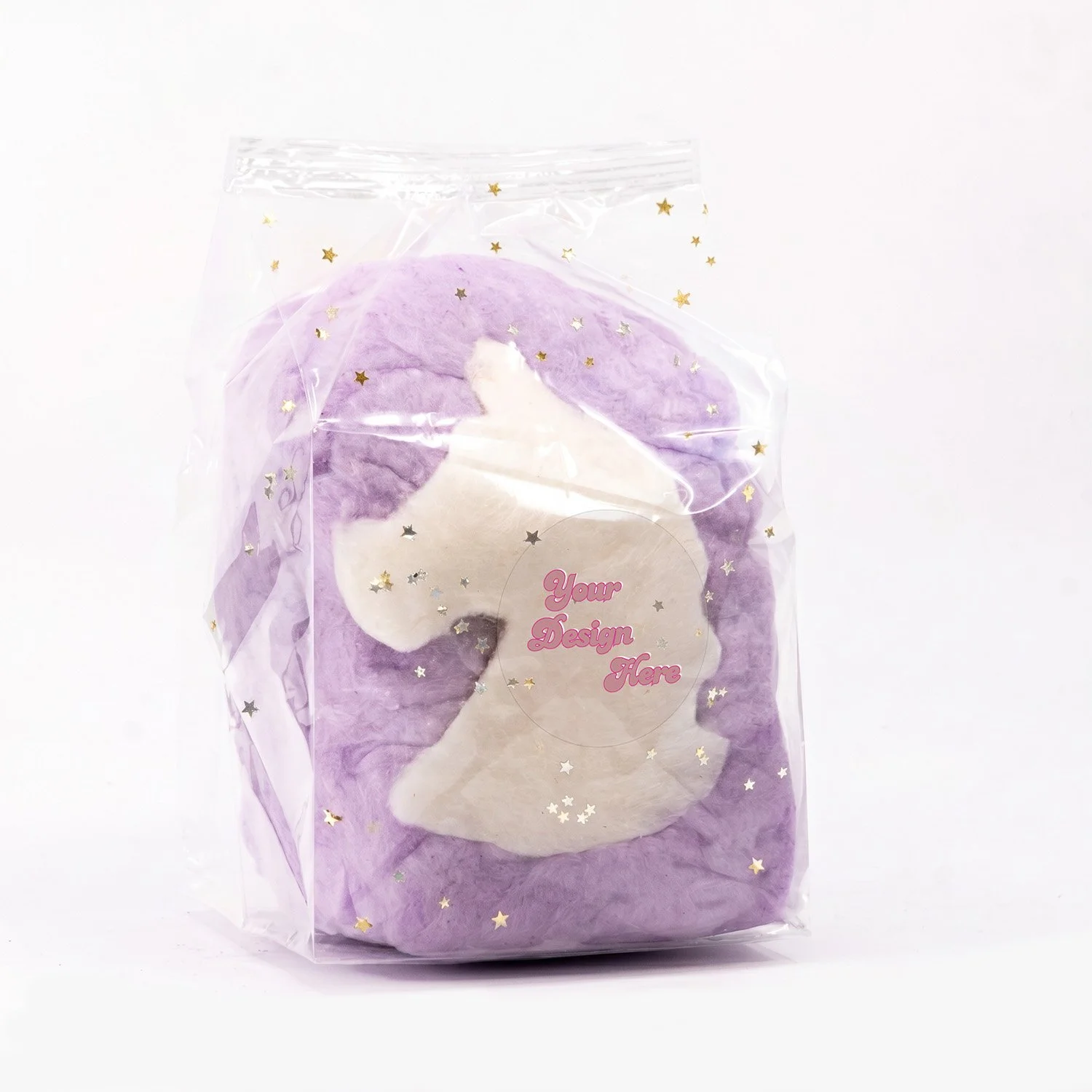 a unicorn cotton candy favor bag with edible glitter and a custom label