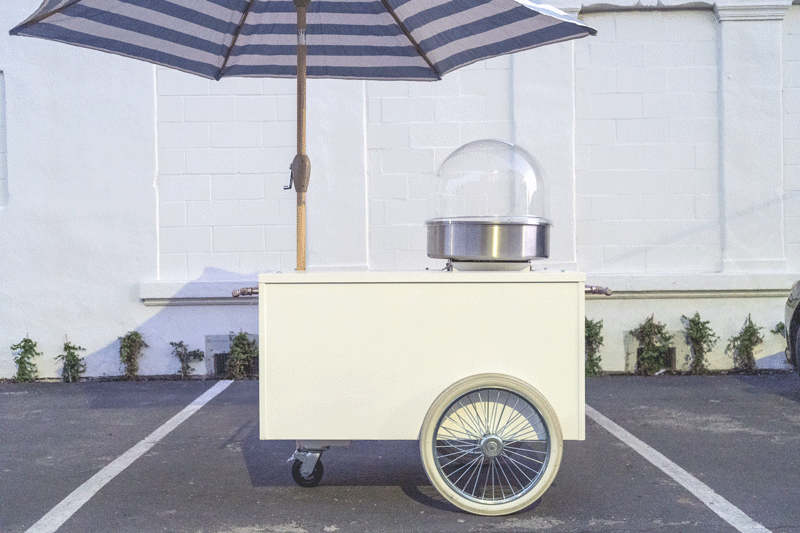 catering cart with custom in-house-printed brand decal and signage