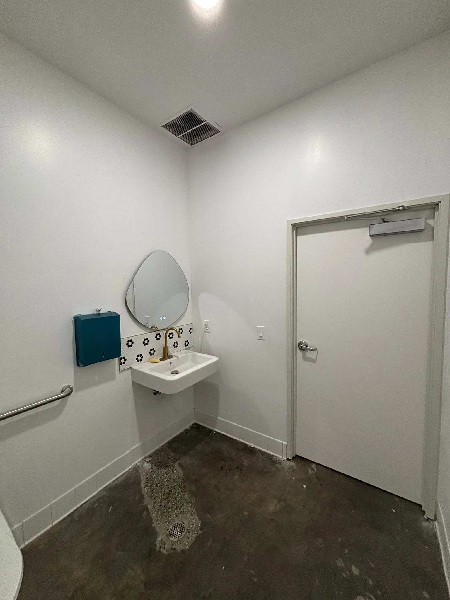 One of two private ADA-accessible restrooms