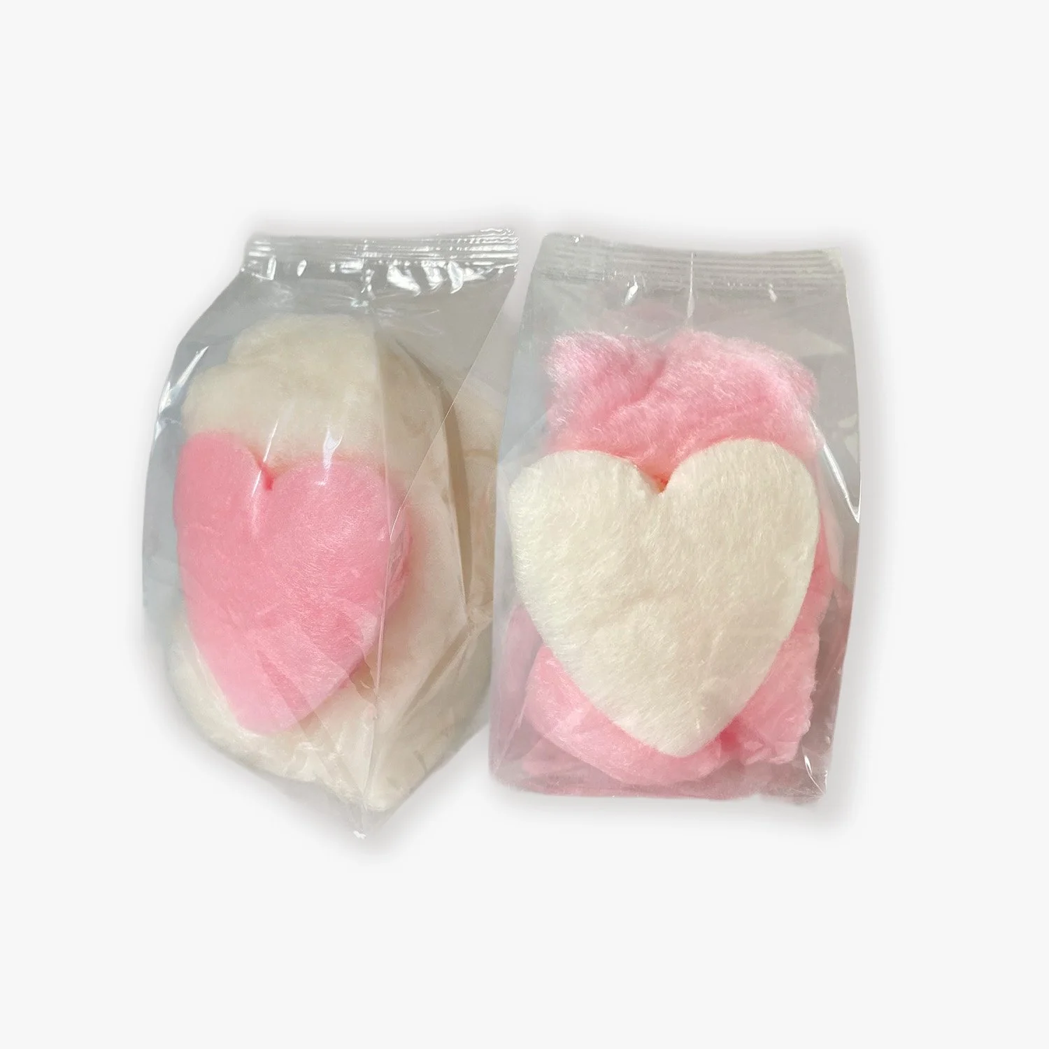 Heart shaped cotton candy favors in pink and white