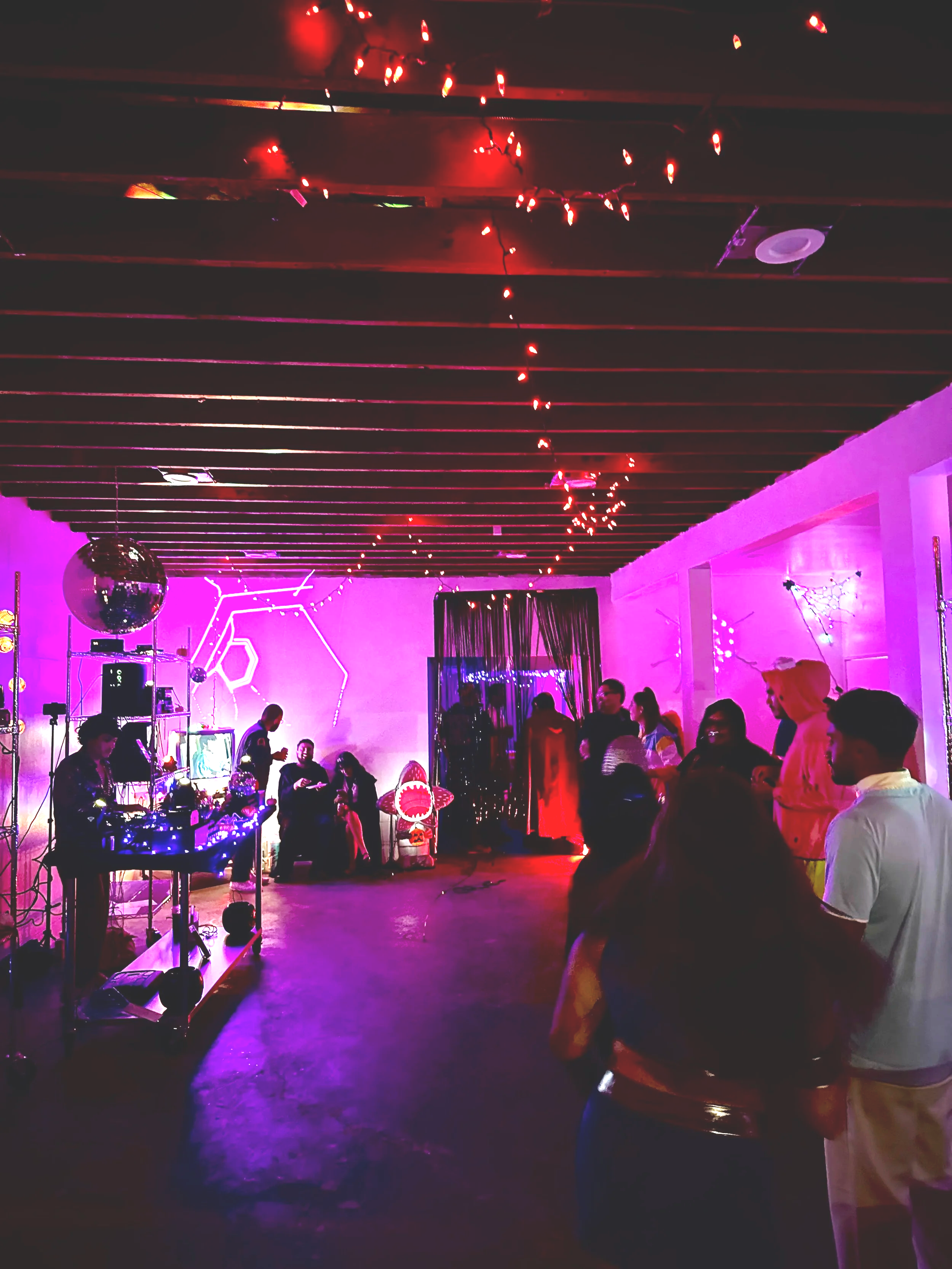 Cotton Candy Factory at night set up for a DJ event with pink lighting