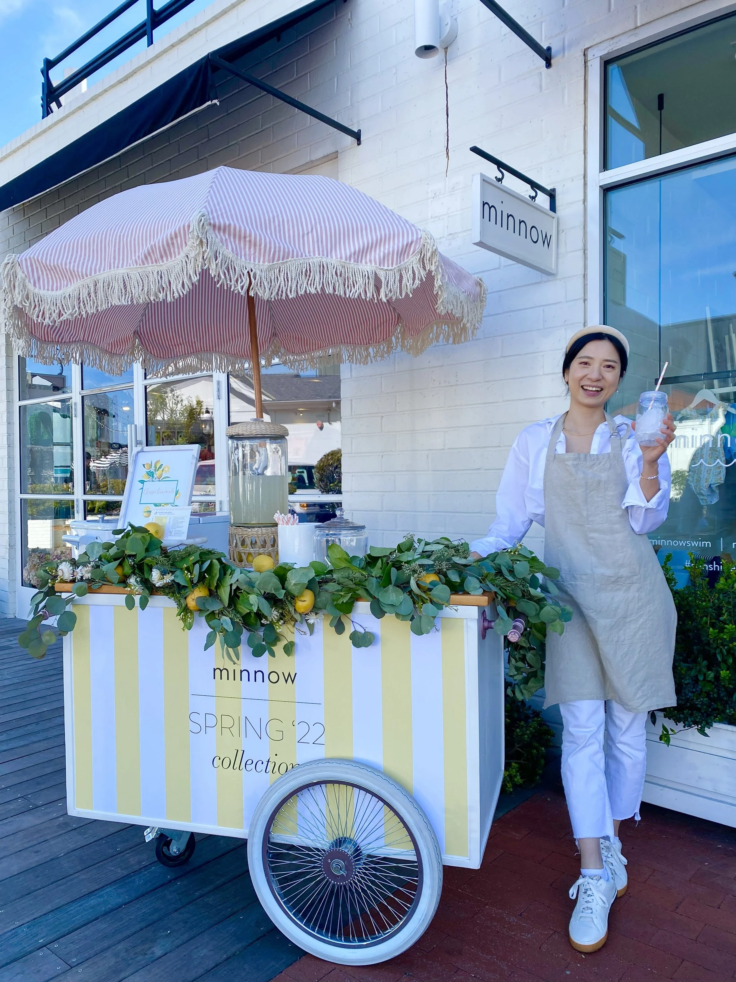the jolly sheep's lemonade cart with custom umbrella and decor