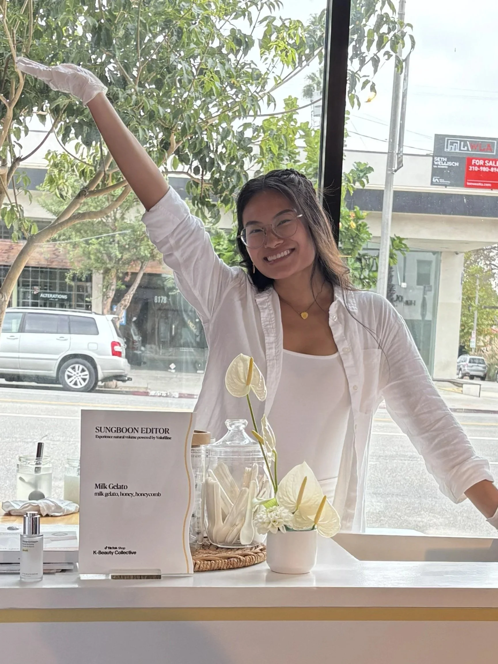 A Jolly Sheep attendant happily serving at the catering cart for an activation