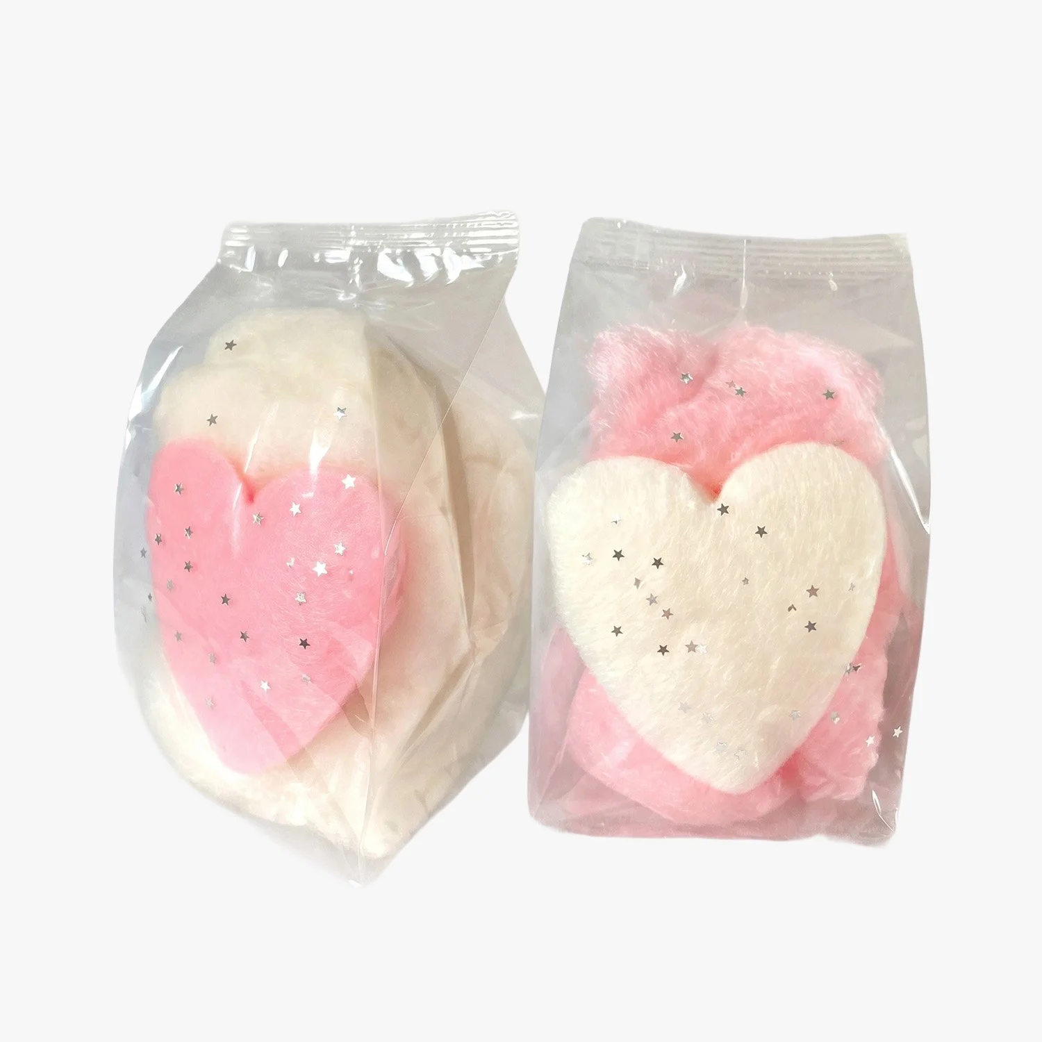 heart shaped cotton candy favors in pink and white with edible silver glitter