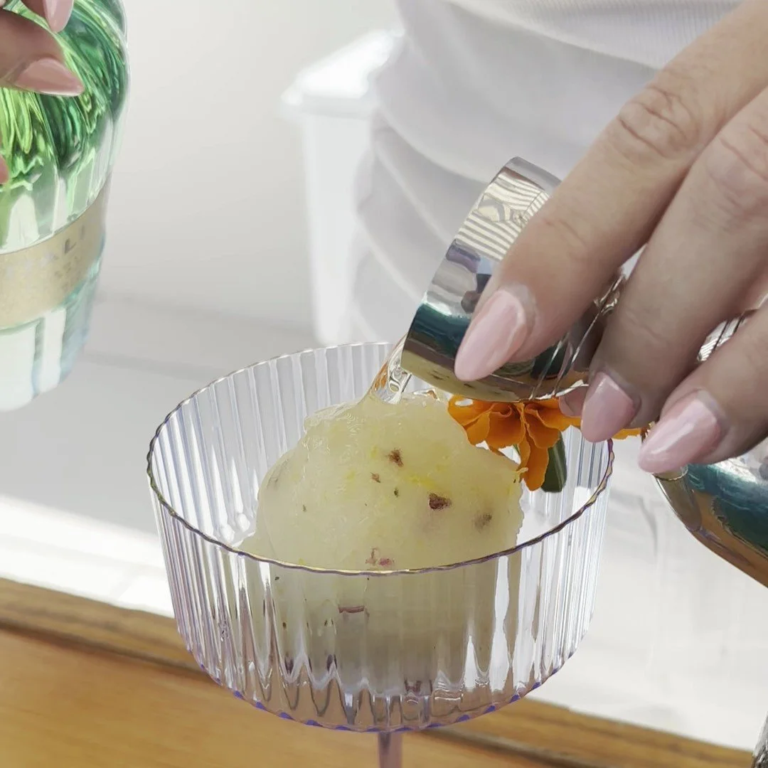 Italicus being poured over lemon lavender sorbet